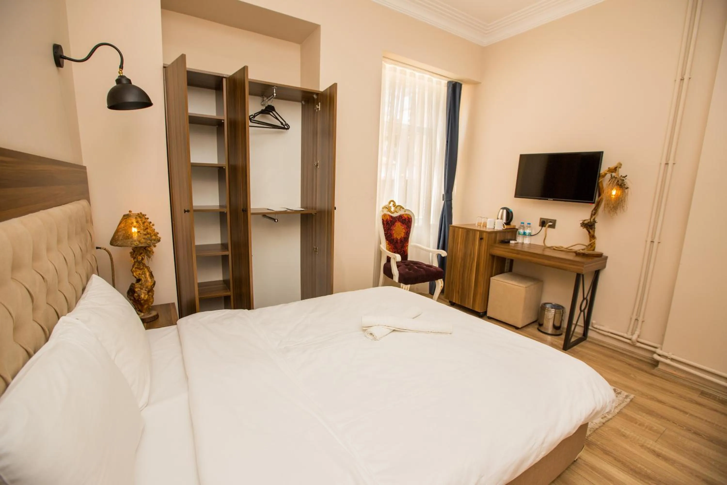 Bed in Corner Garden Hotel