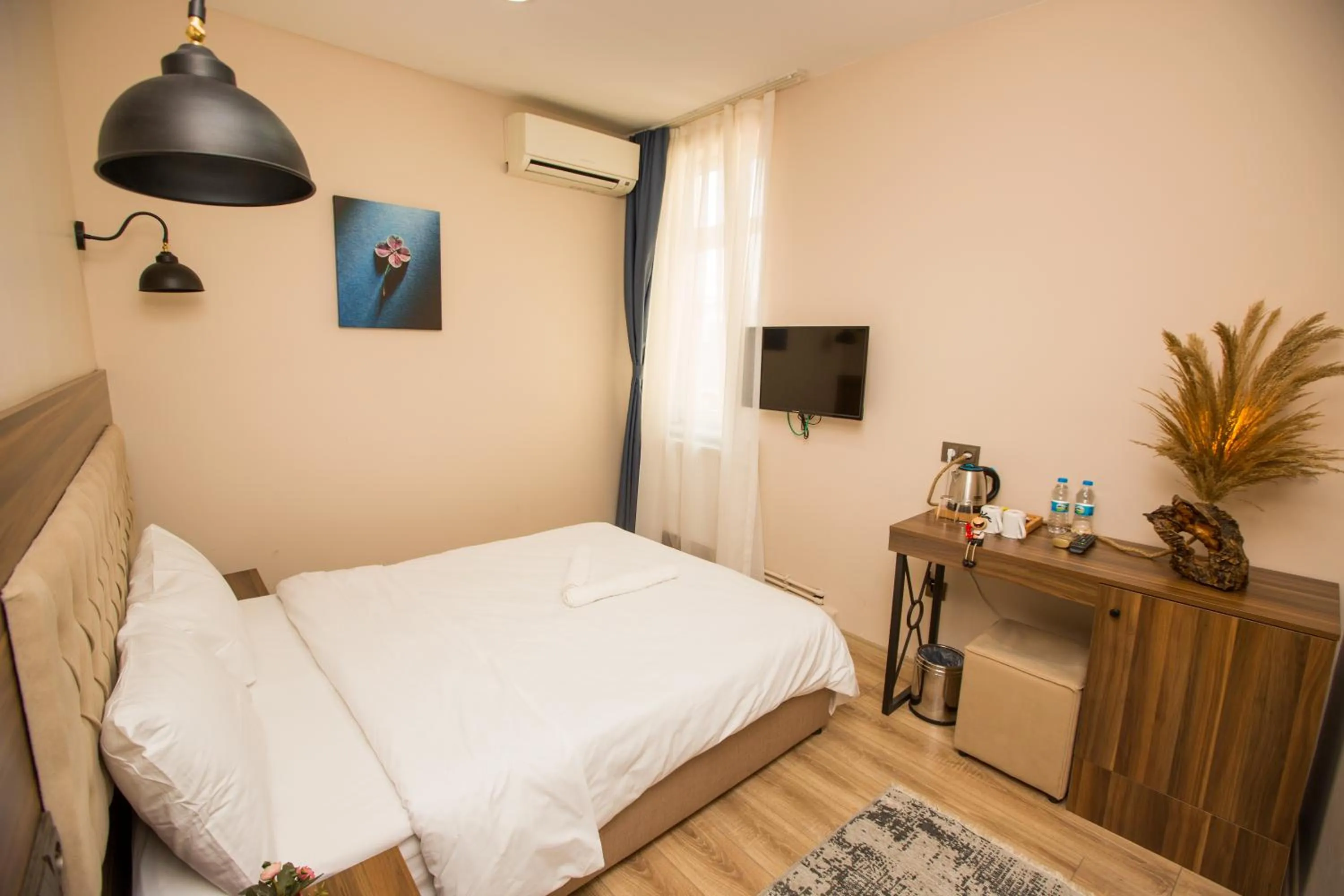 Bed in Corner Garden Hotel