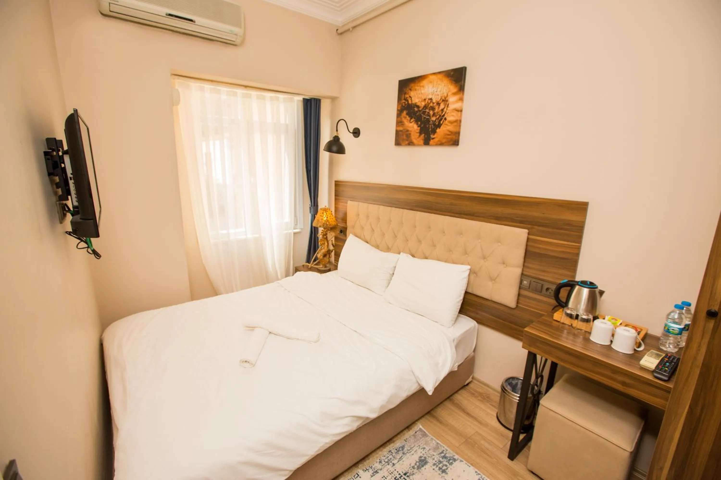 Bed in Corner Garden Hotel