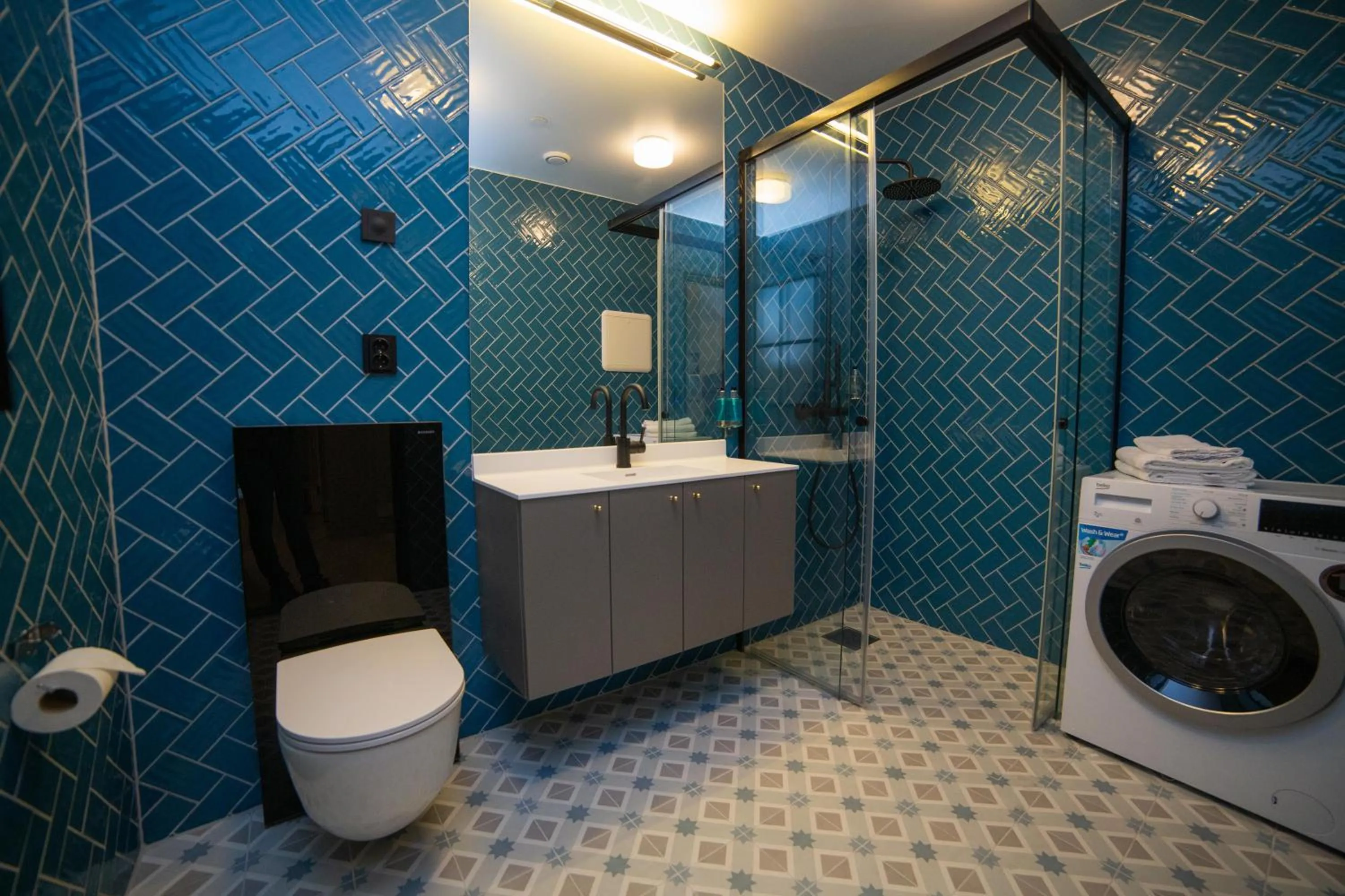 Bathroom in Home Again Apartments Kirkegata