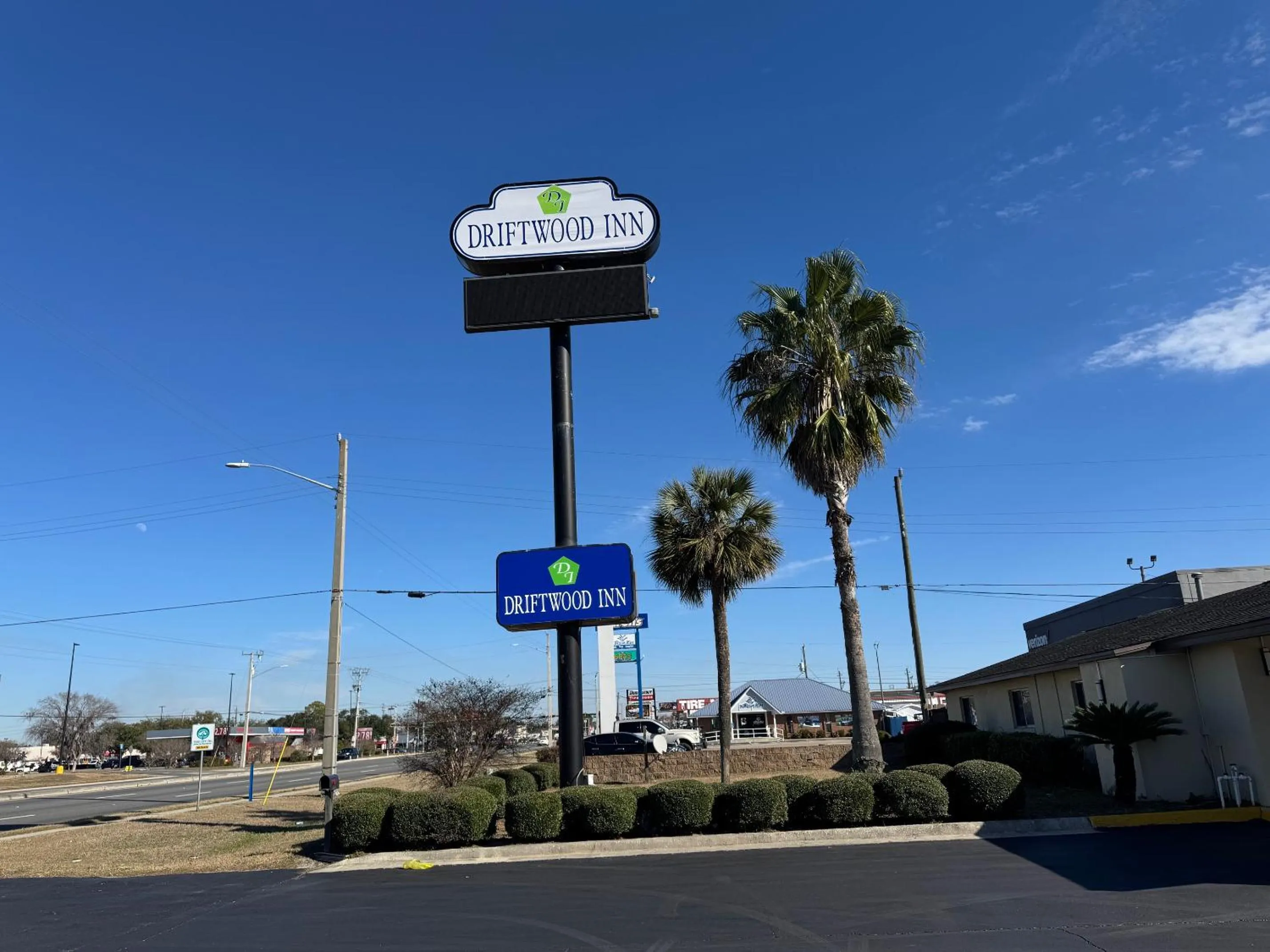 Property logo or sign in Driftwood Inn - Lake City