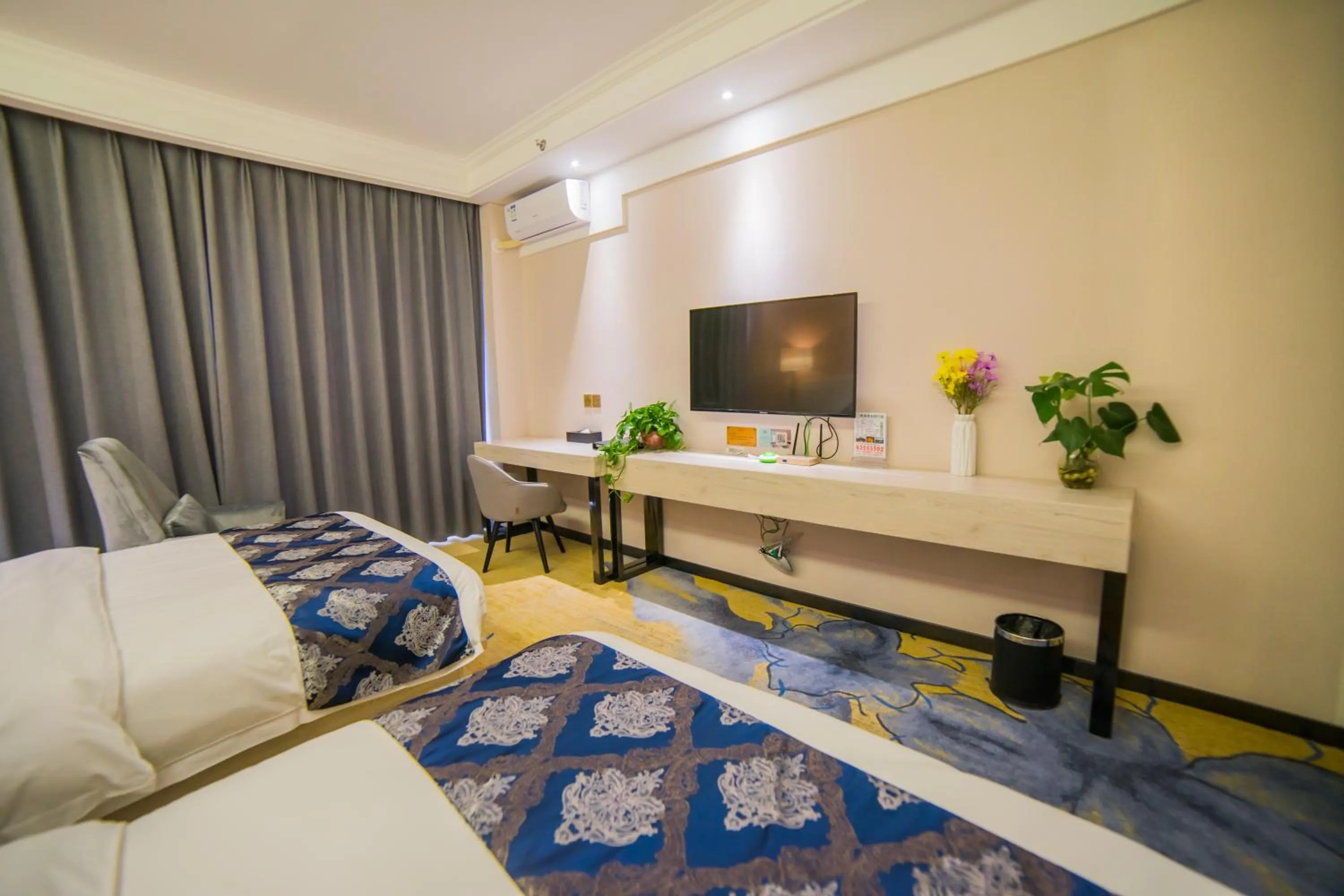 TV and multimedia in Demei Boutique Hotel