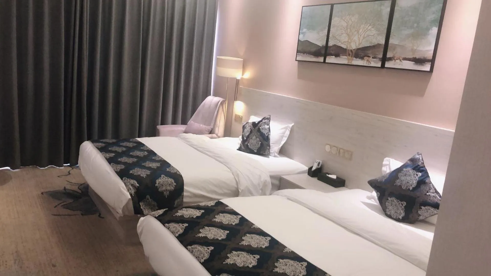 Bed in Demei Boutique Hotel