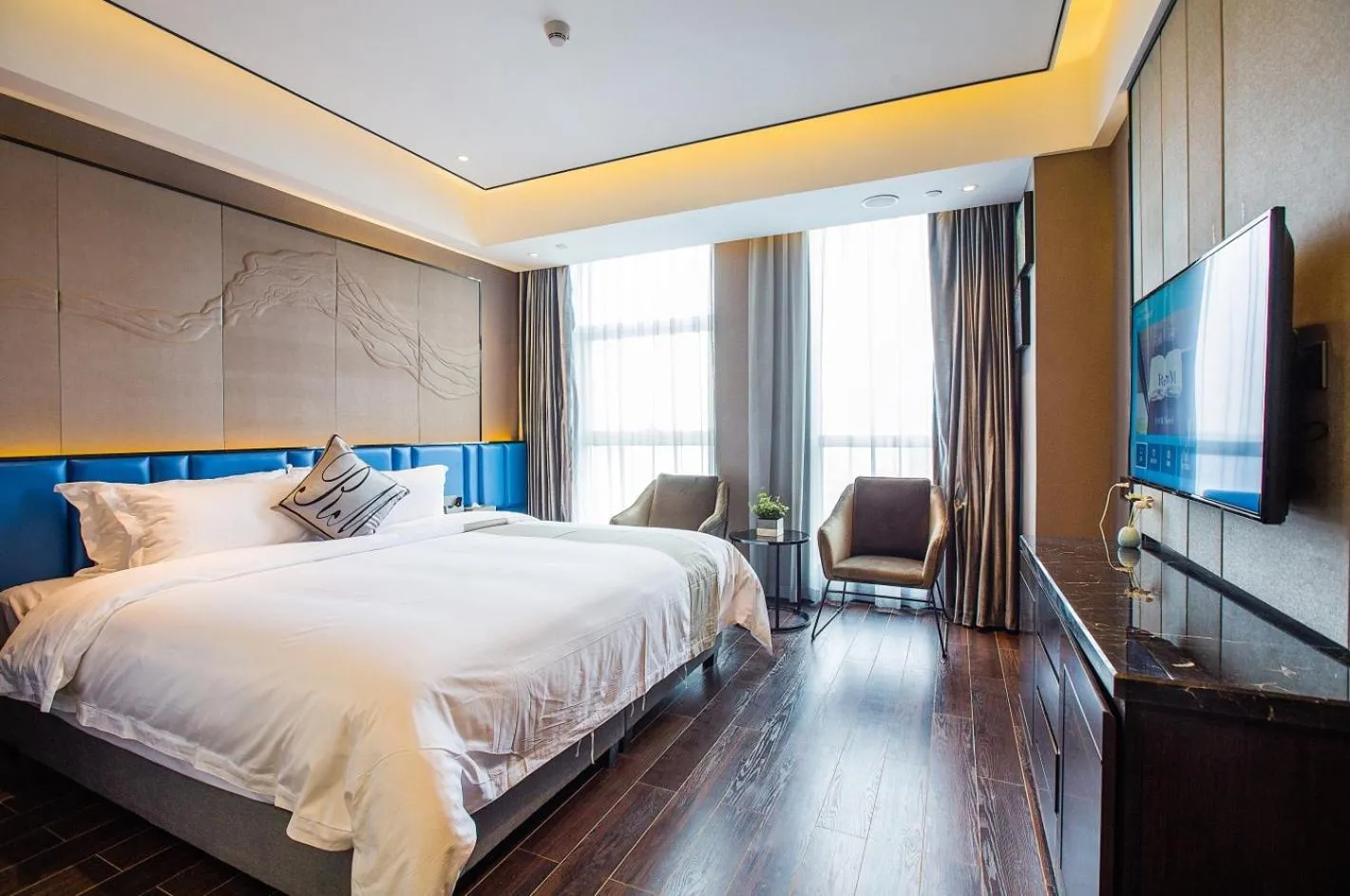 Bed in Ruiman International Hotel