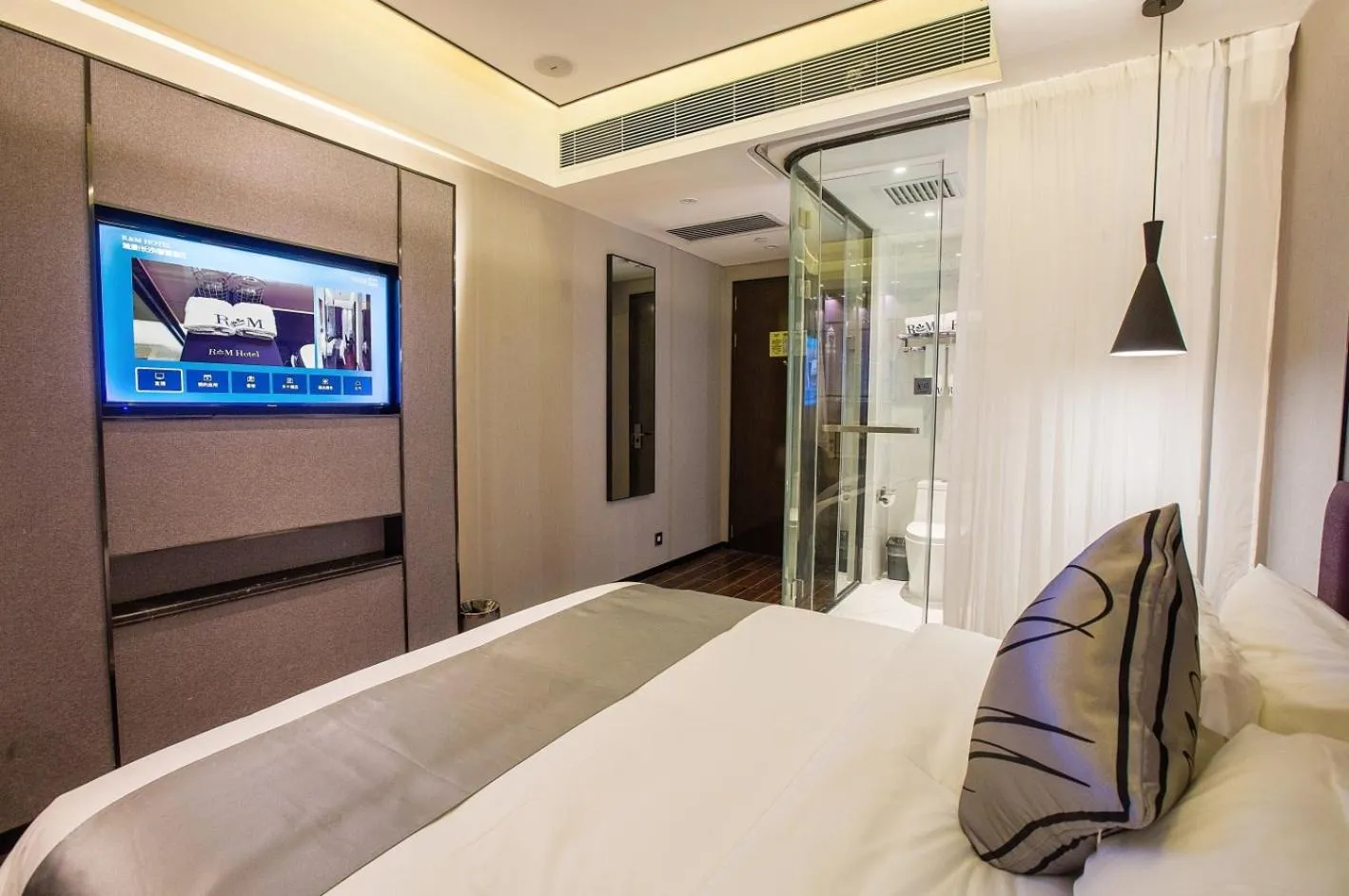 Bed in Ruiman International Hotel