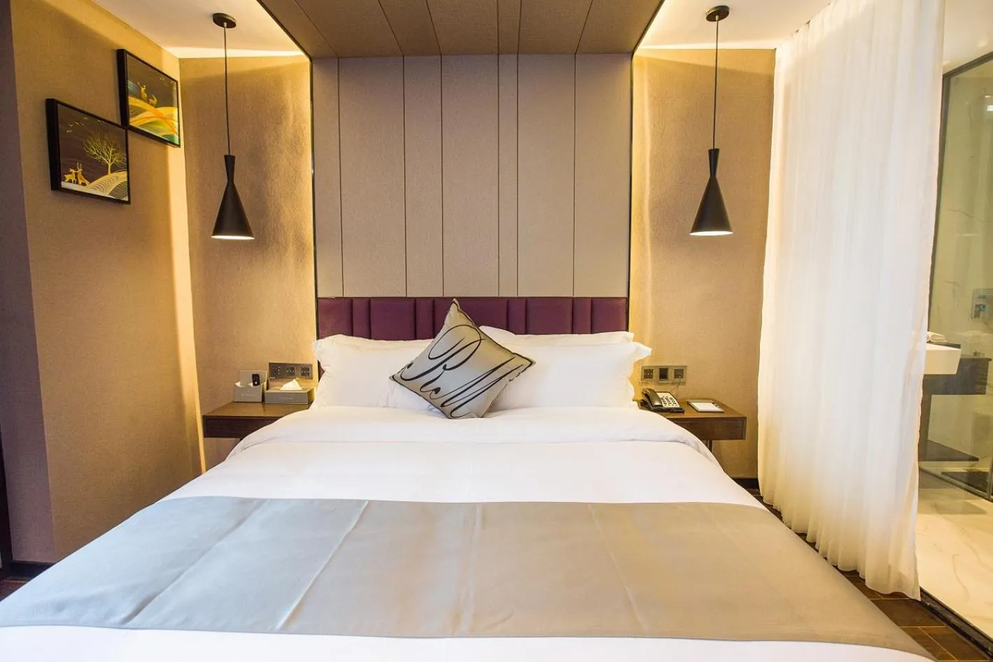 Bed in Ruiman International Hotel