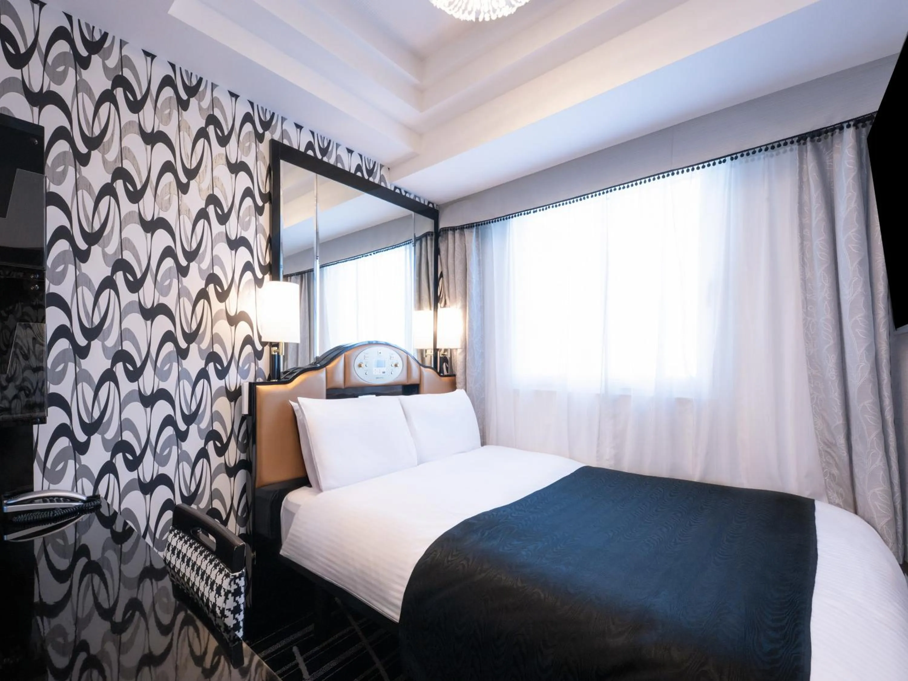 Bed in APA Hotel Yamanote Otsuka Ekimae Tower