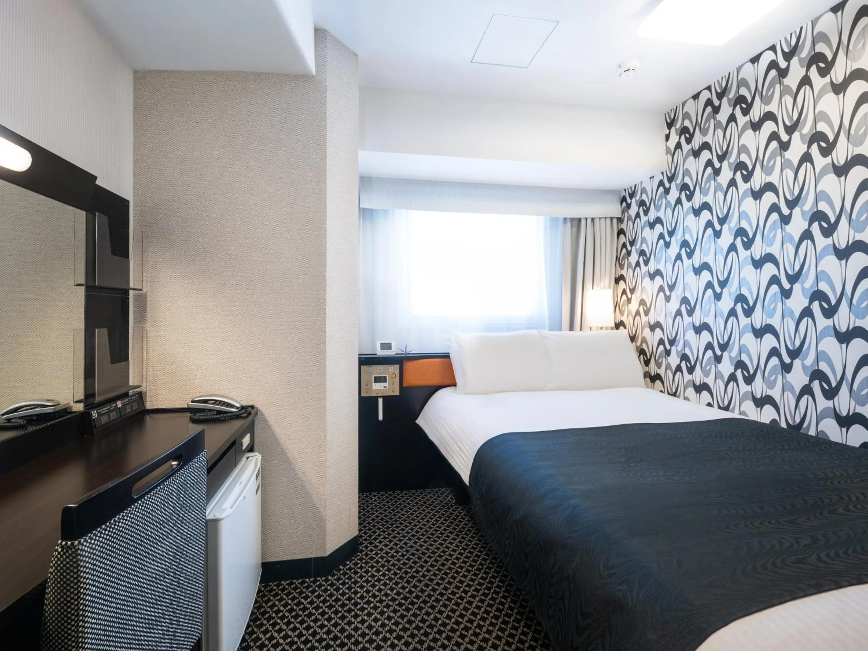 Bed in APA Hotel Yamanote Otsuka Ekimae Tower