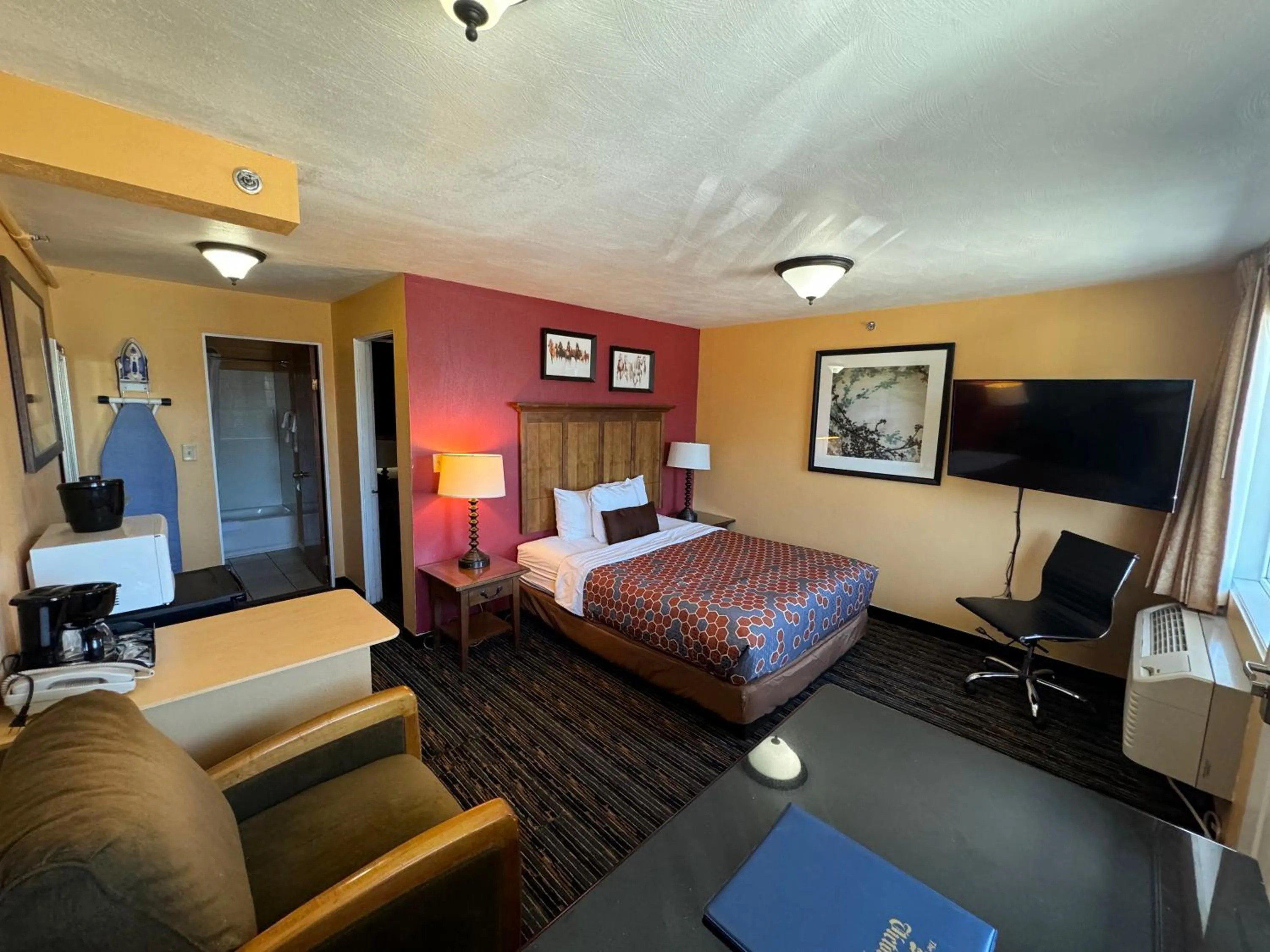 Bed in The Royal Victorian Motel