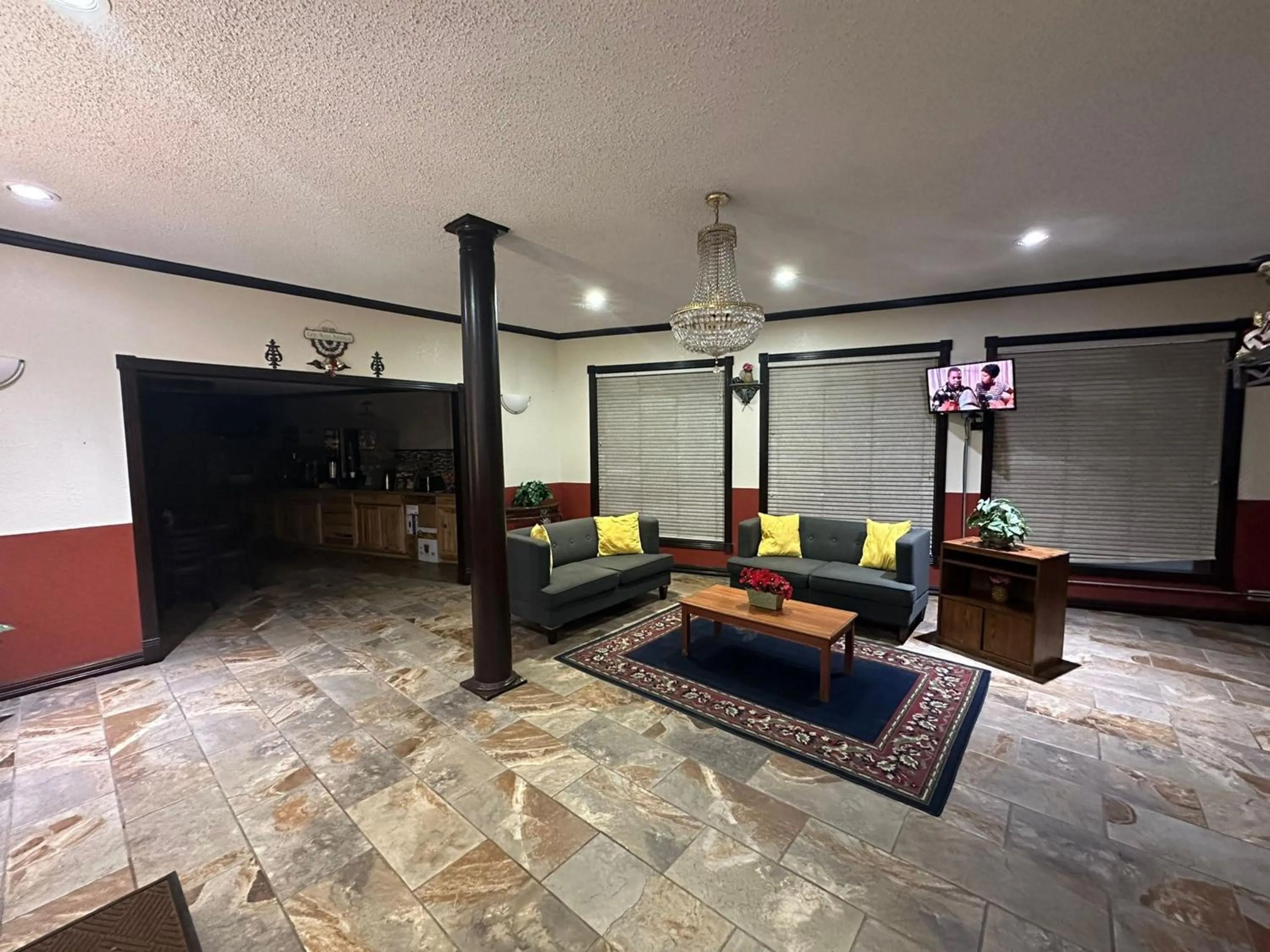 Seating area in Super 8 by Wyndham Athens TX