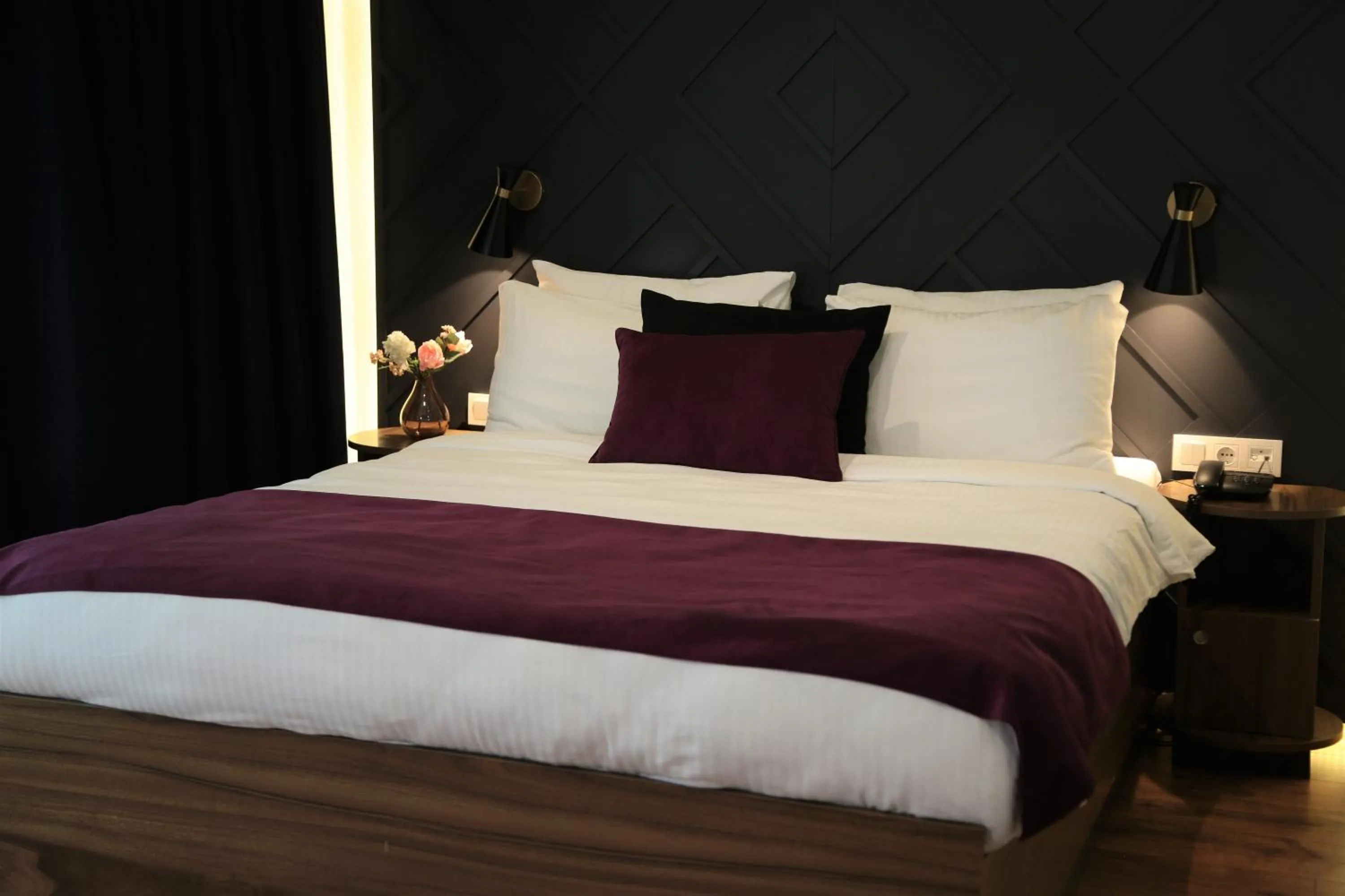 Bed in The Roomy Hotel Şişli