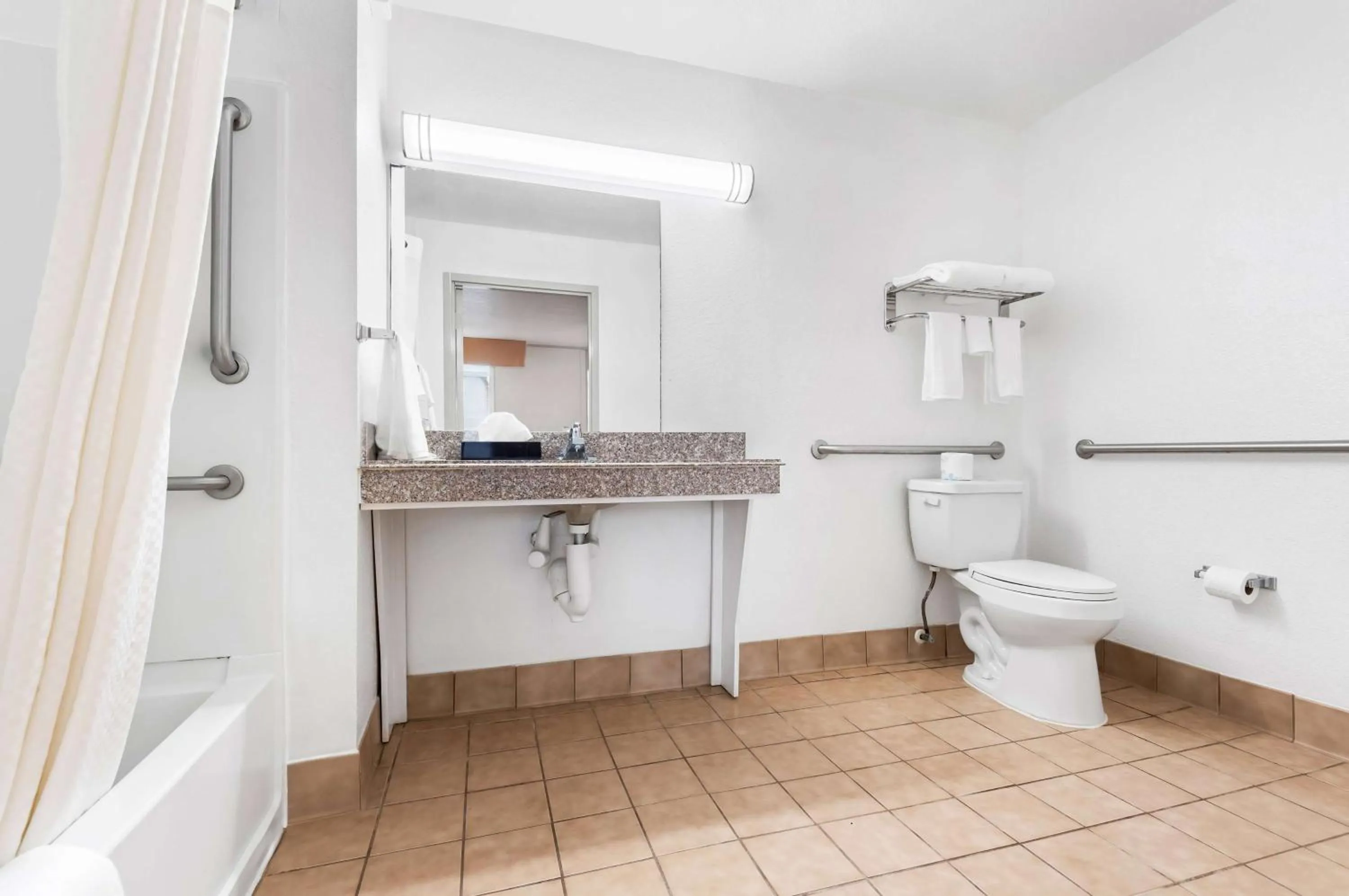 Photo of the whole room in Super 8 by Wyndham Baton Rouge/I-10