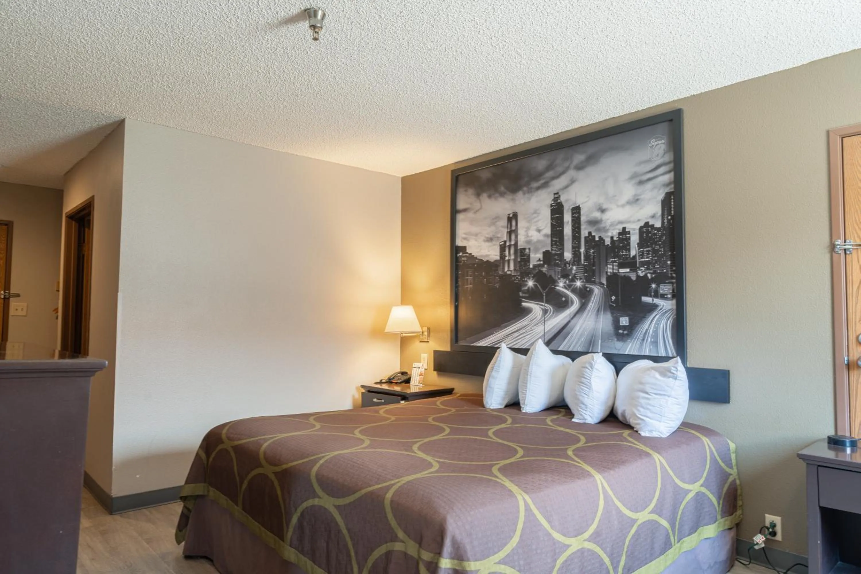 Bed in Super 8 by Wyndham Grants