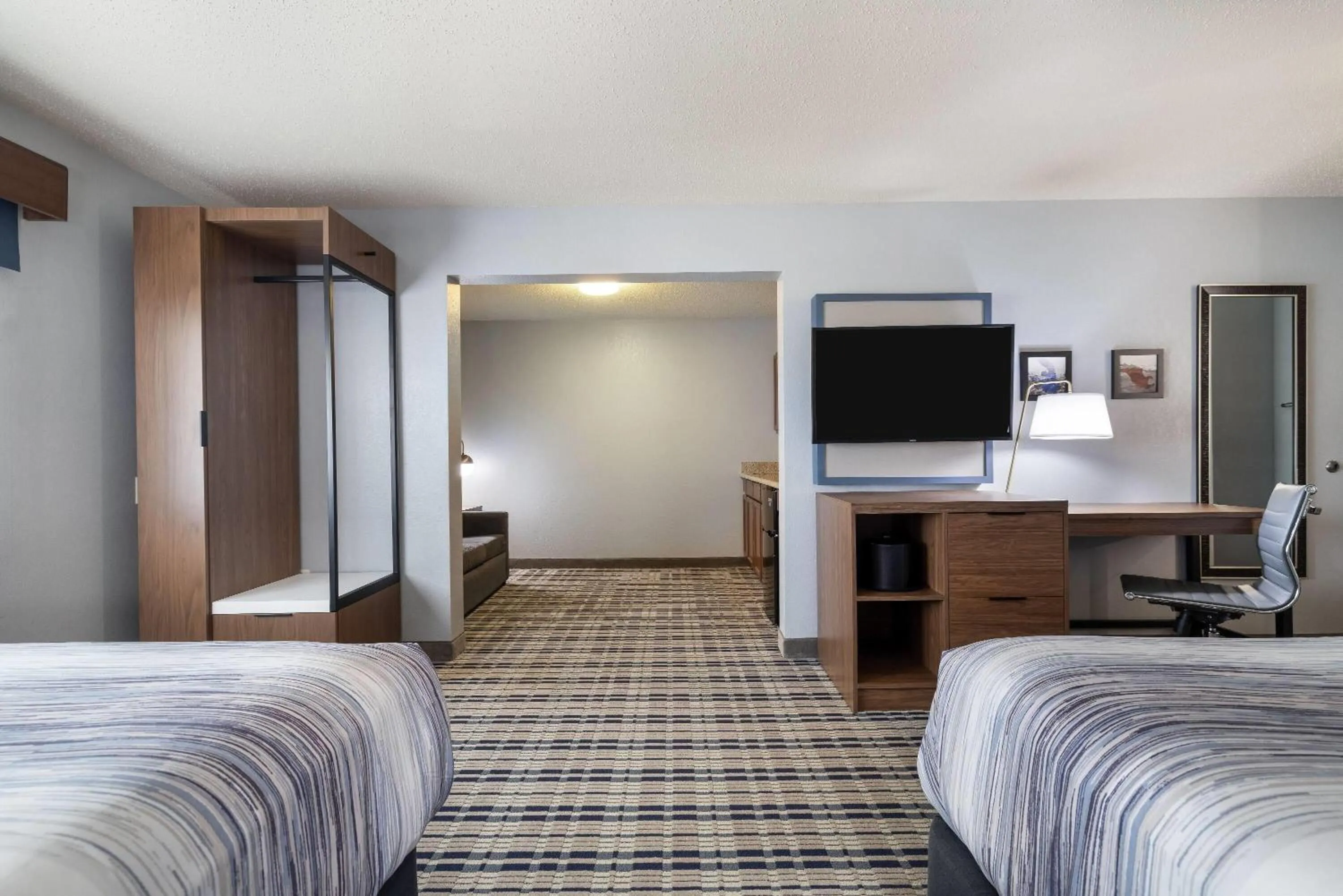 Photo of the whole room, Bed in AmericInn by Wyndham Chamberlain Conference Center