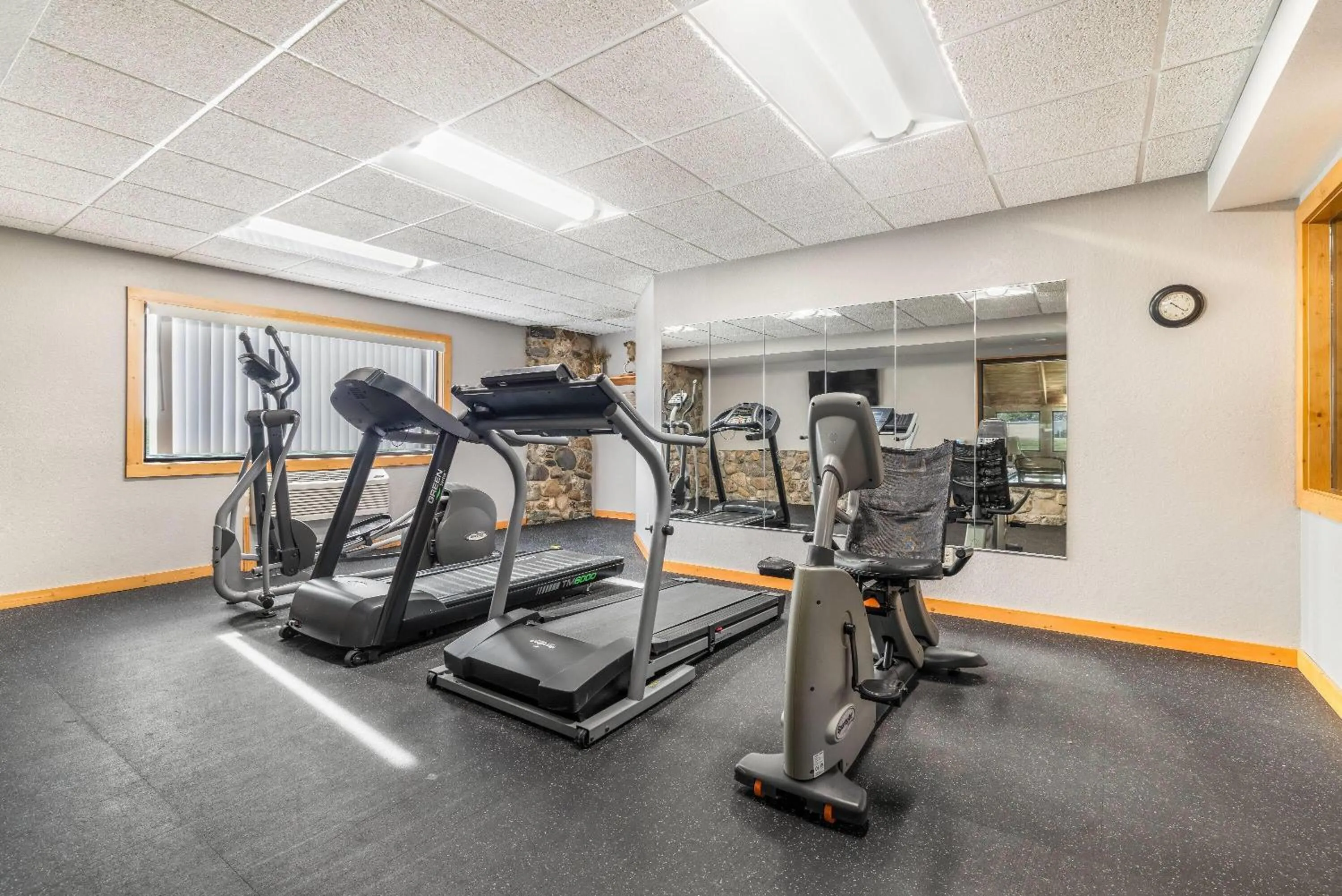 Fitness centre/facilities in AmericInn by Wyndham Chamberlain Conference Center