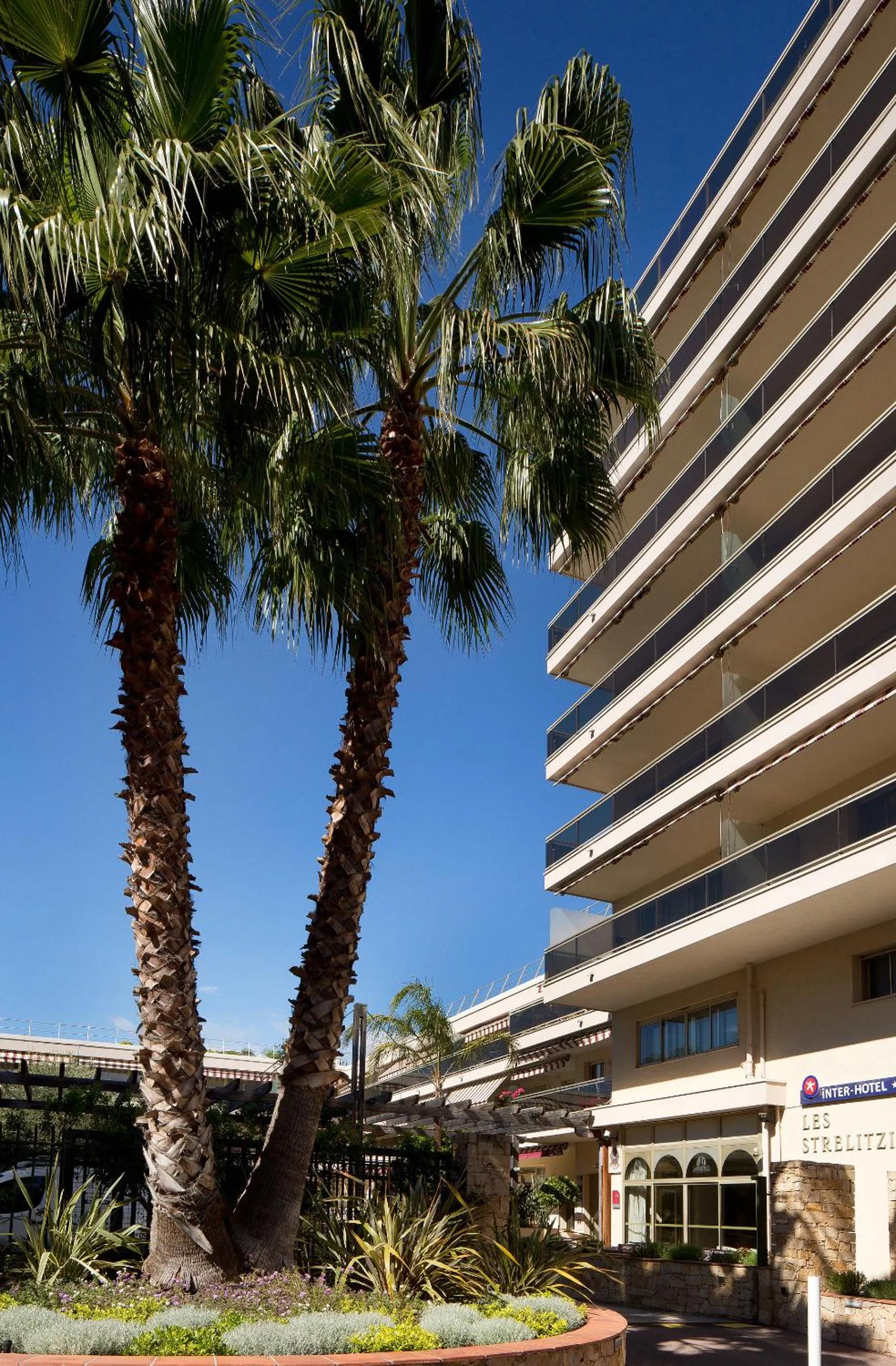 Property building in The Originals Boutique, Hôtel Les Strélitzias