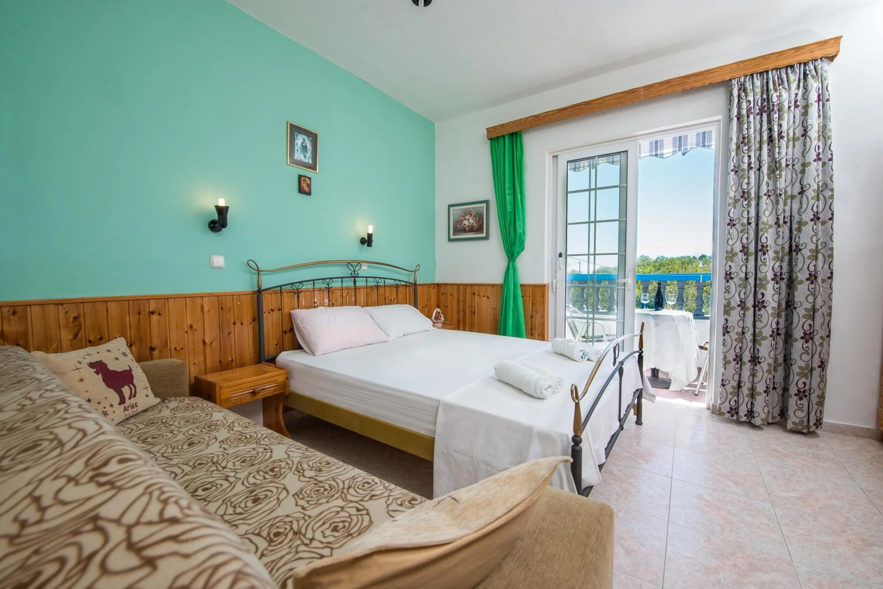 Bed in Poseidon Apartment