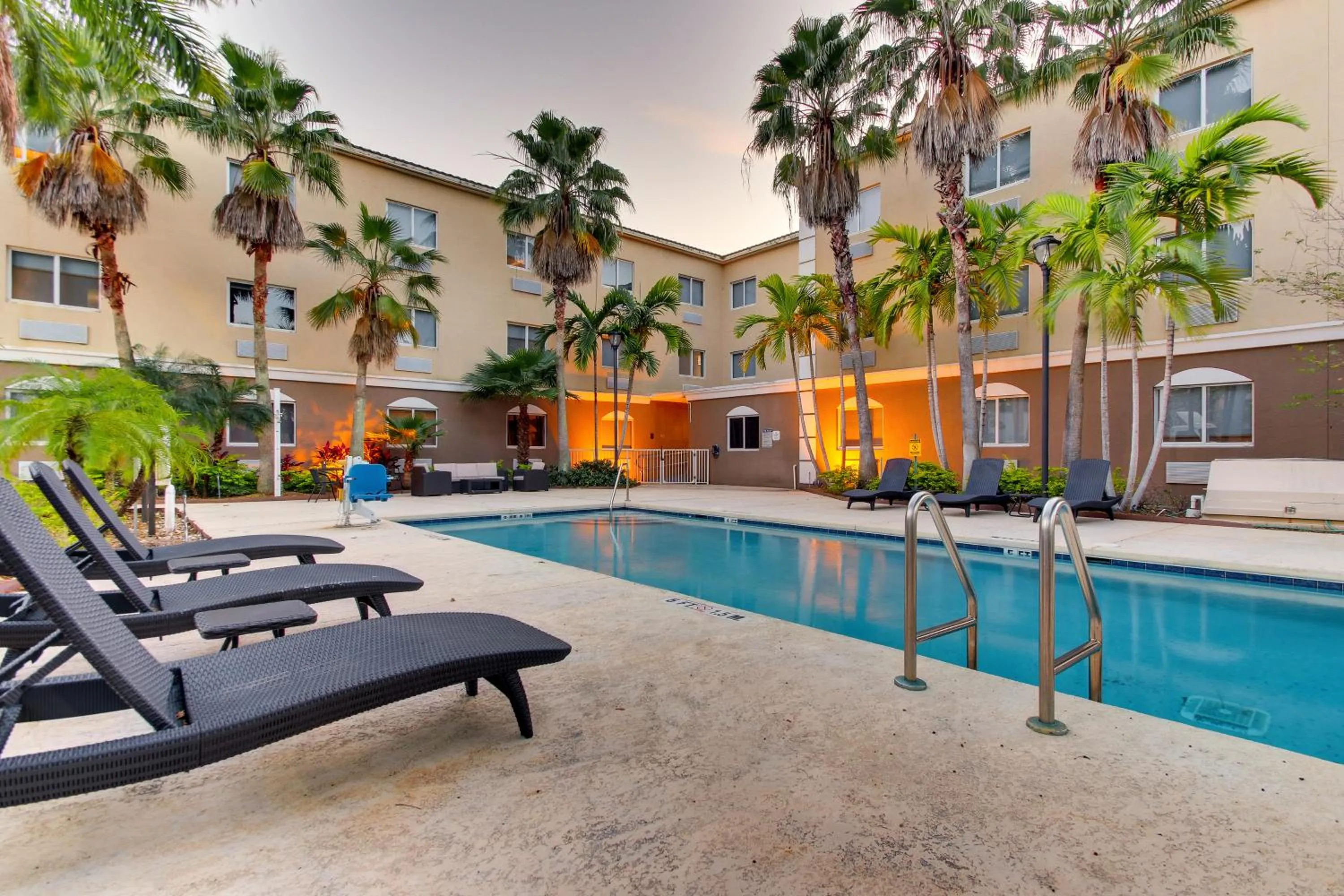 Swimming pool in Holiday Inn Express West Palm Beach Metrocentre by IHG