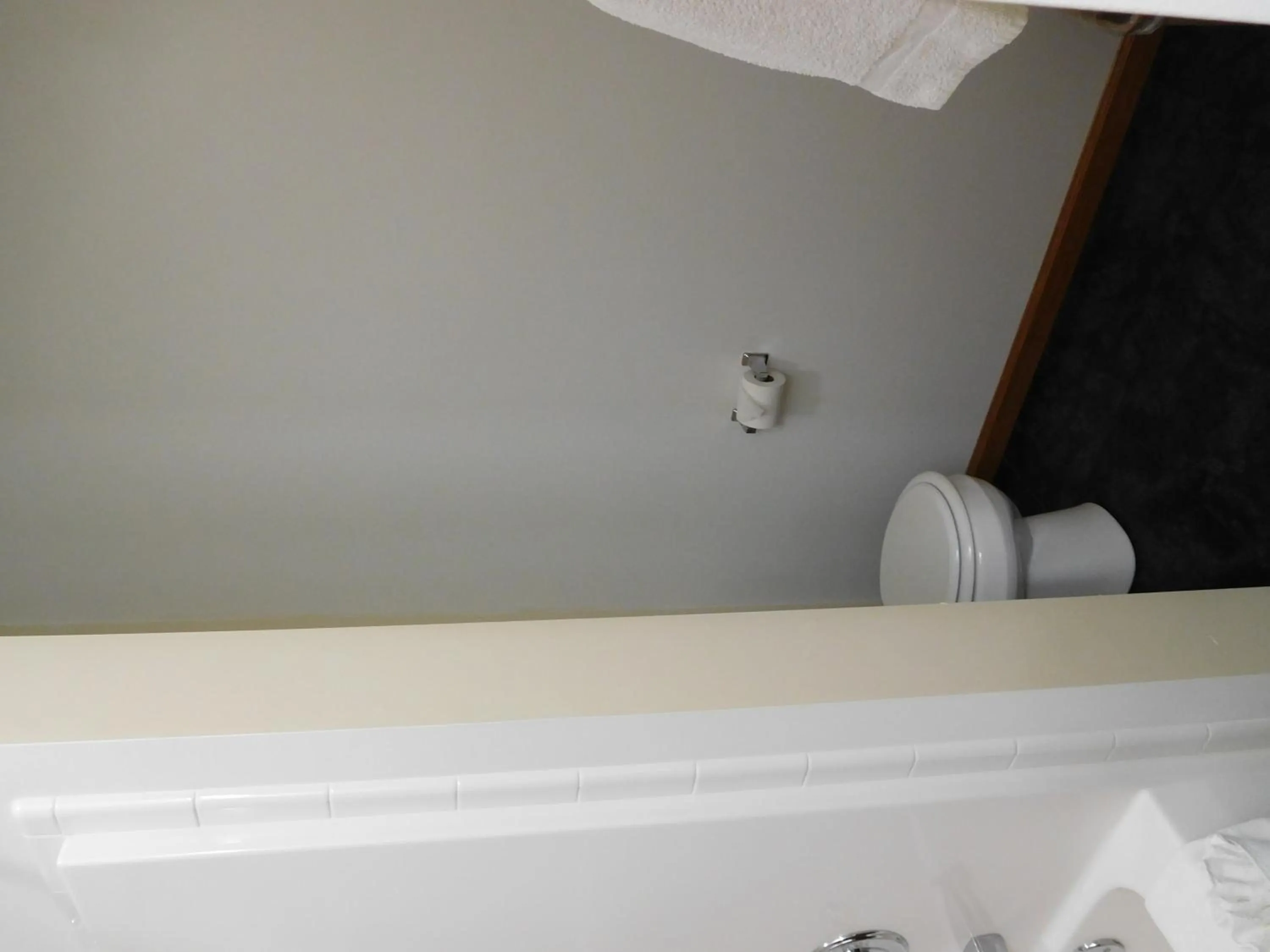 Toilet in Attica Inn