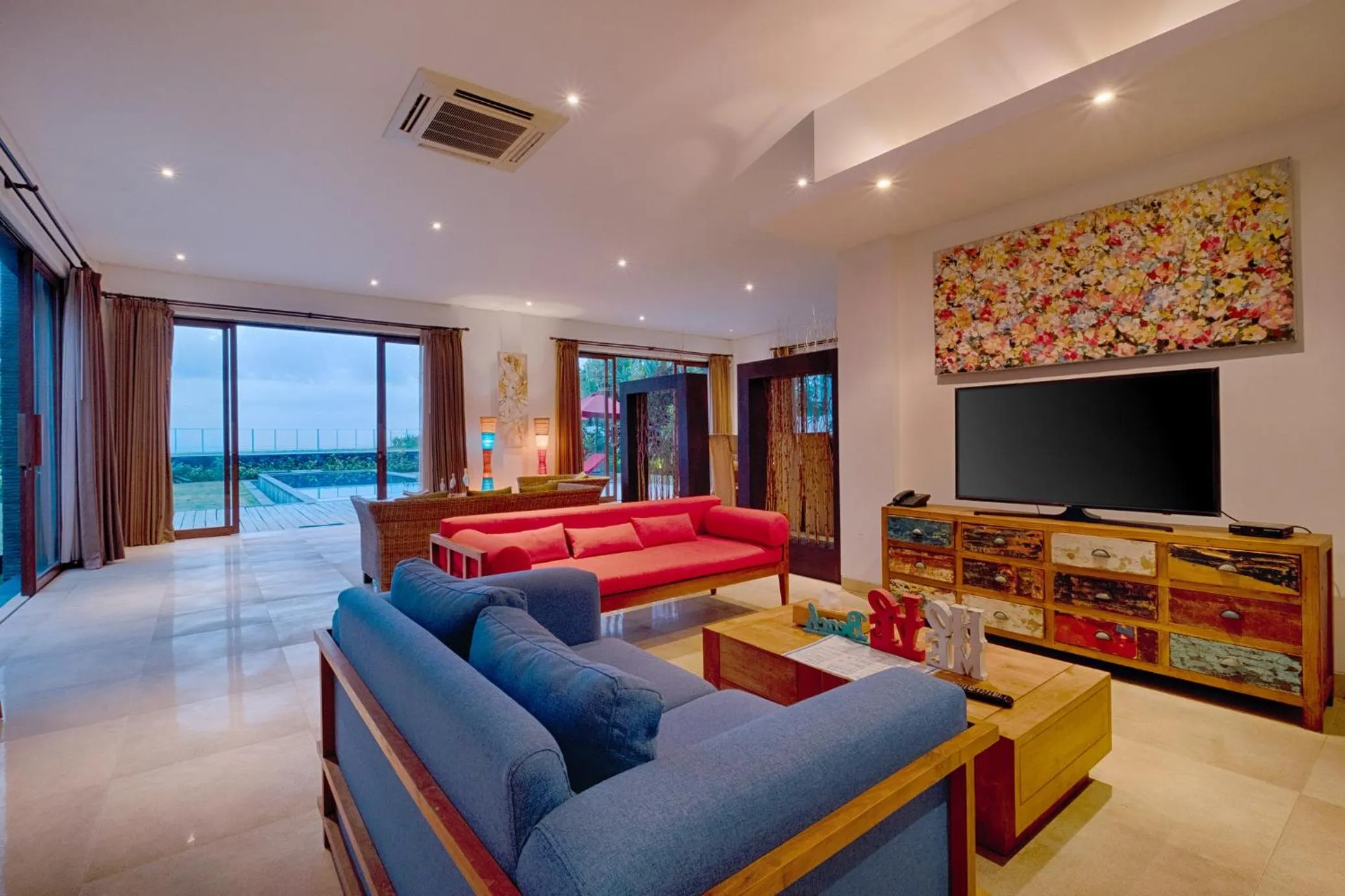 Living room, Bed in Keramas Beachfront Villa by Sanga Sanga Hospitality