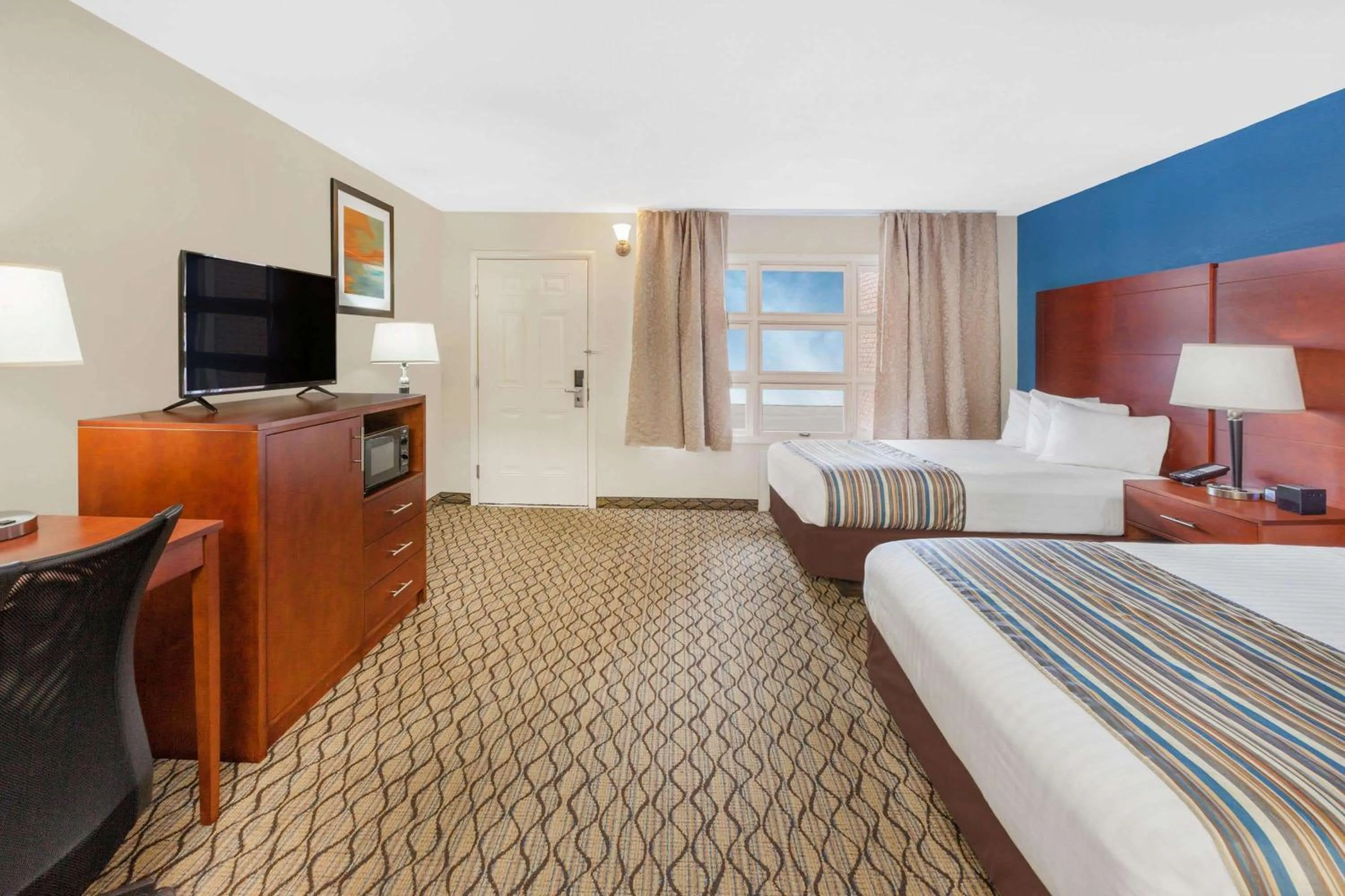 Photo of the whole room in Baymont by Wyndham St. Ignace Lakefront