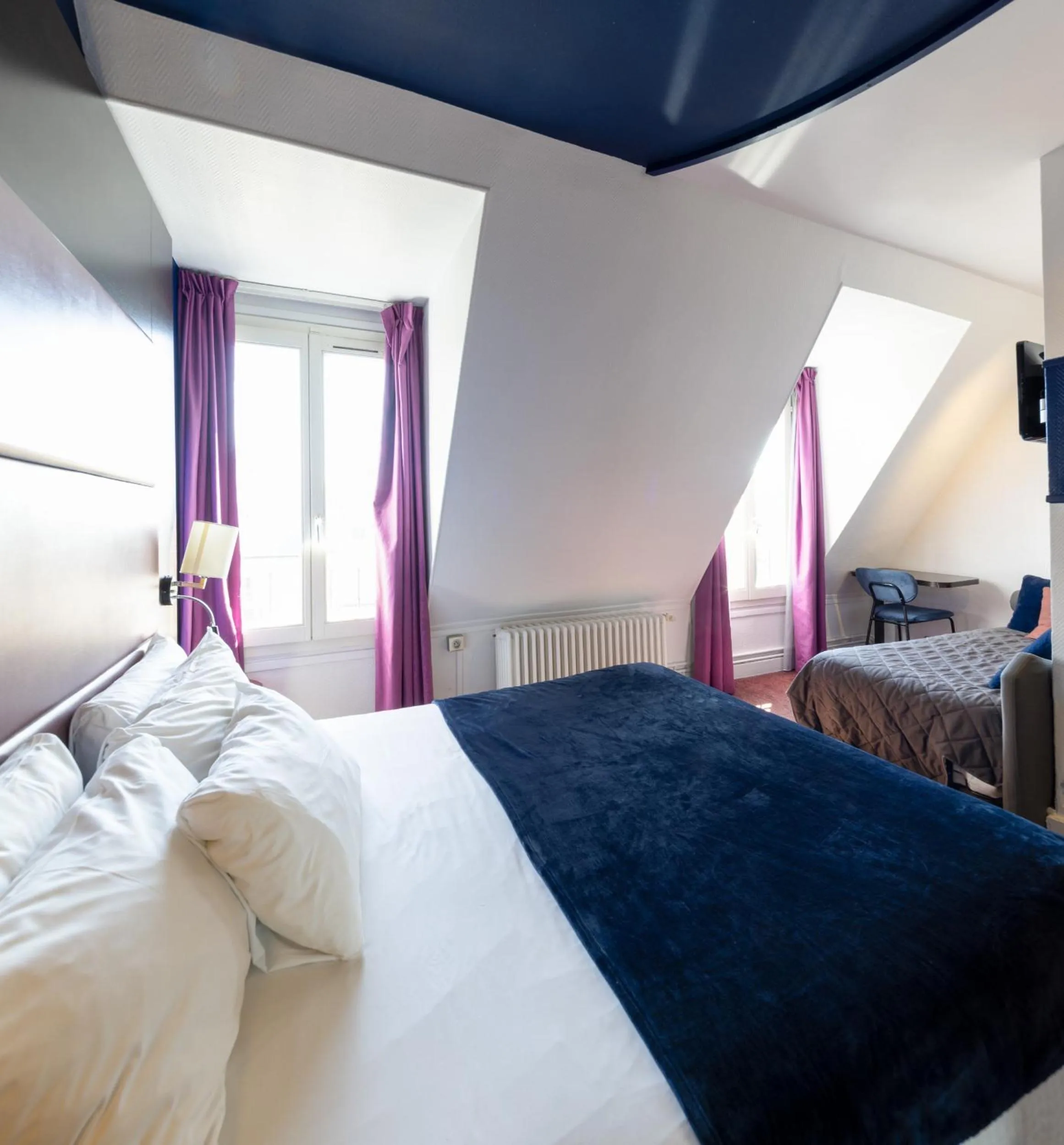 Photo of the whole room, Bed in Accueil Hôtel Paris Pigalle Montmartre