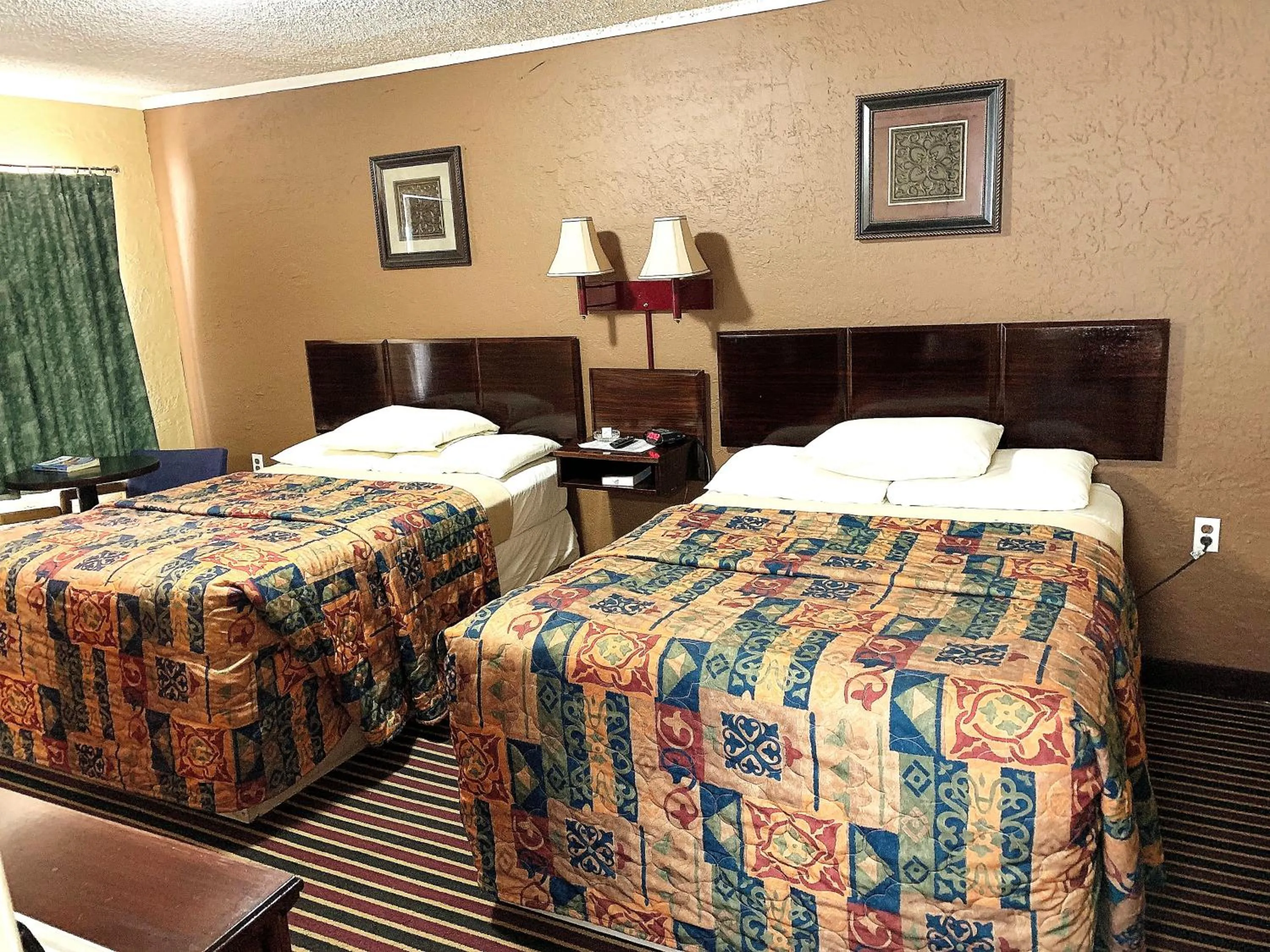 Bed in Relax Inn Vinita