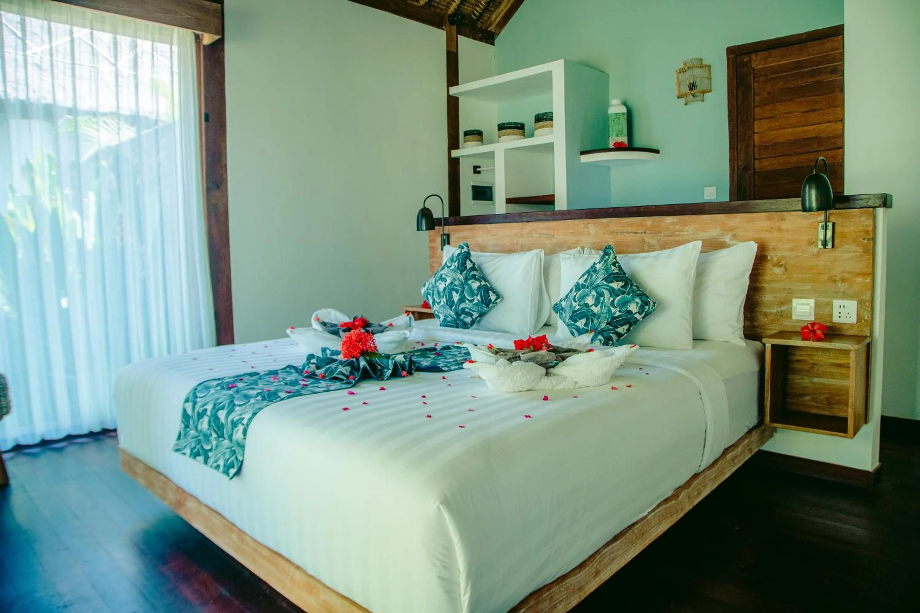 Bed in Segara Lombok Beach Resort