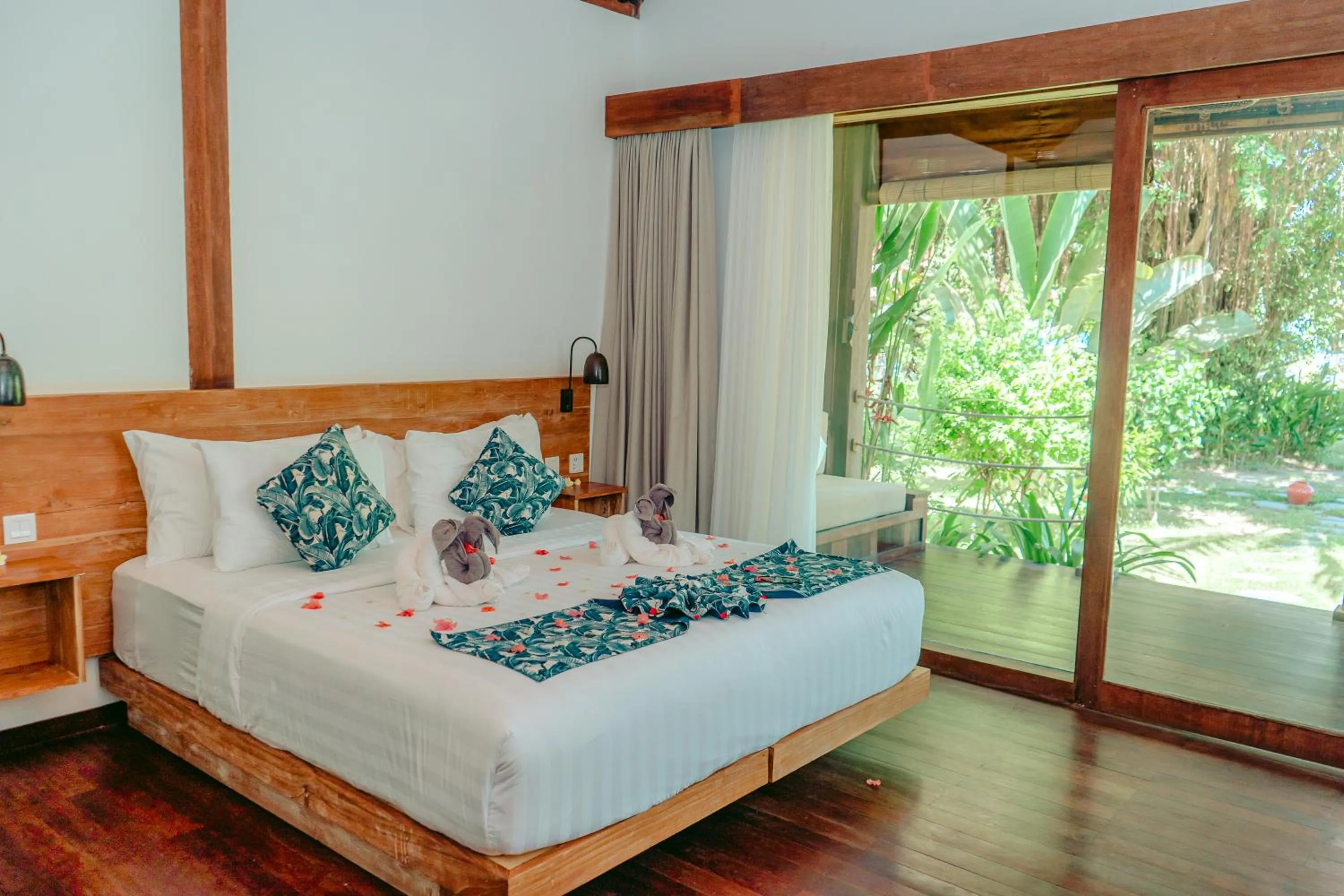 Bed in Segara Lombok Beach Resort