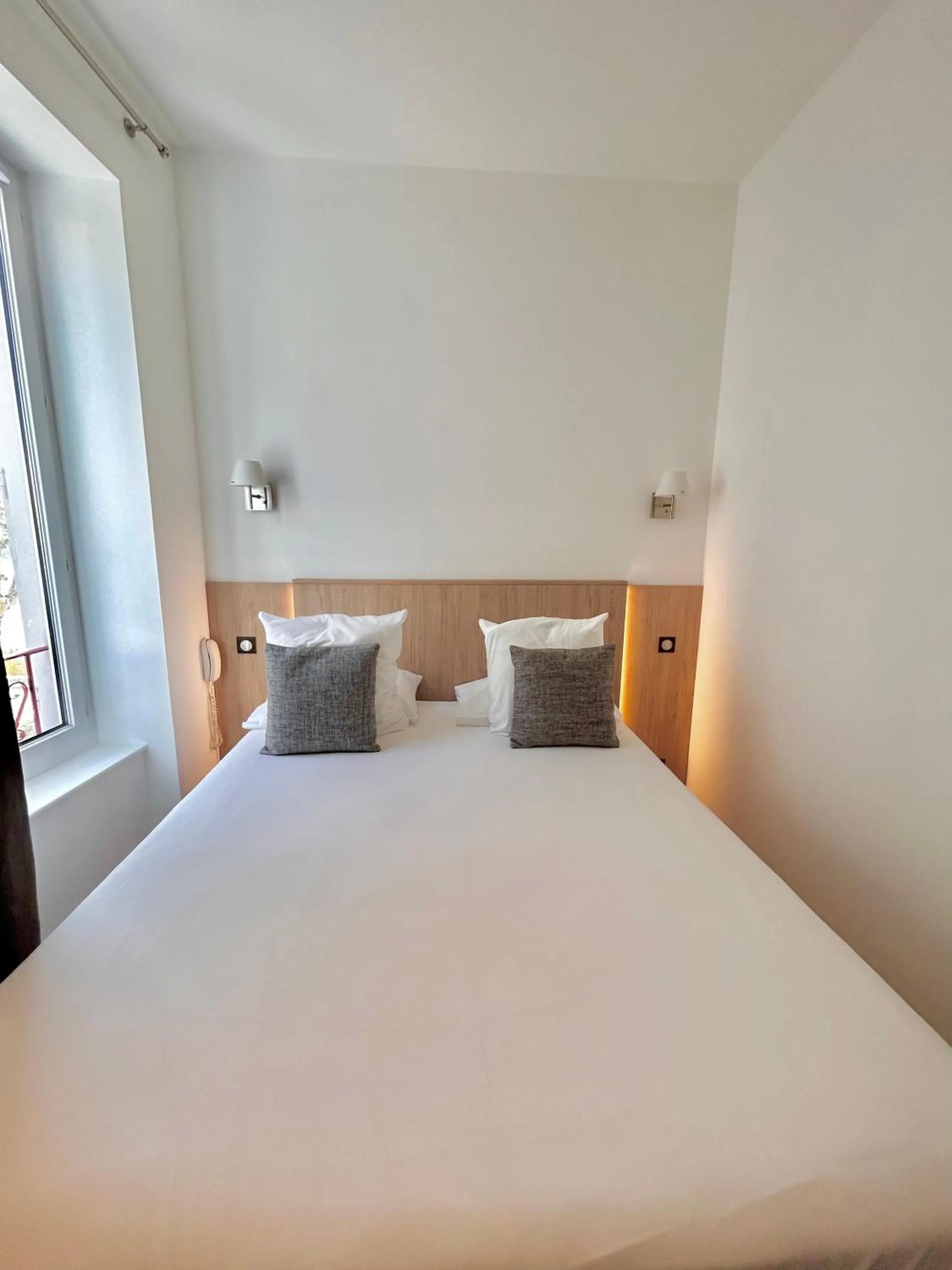 Bed in Hôtel Les Deux Coteaux