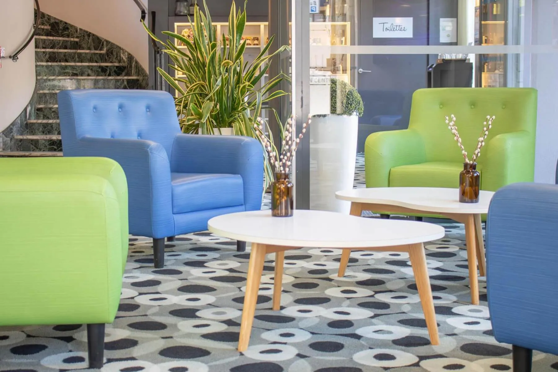 Communal lounge/ TV room in Brit Hotel Mâcon Centre Gare