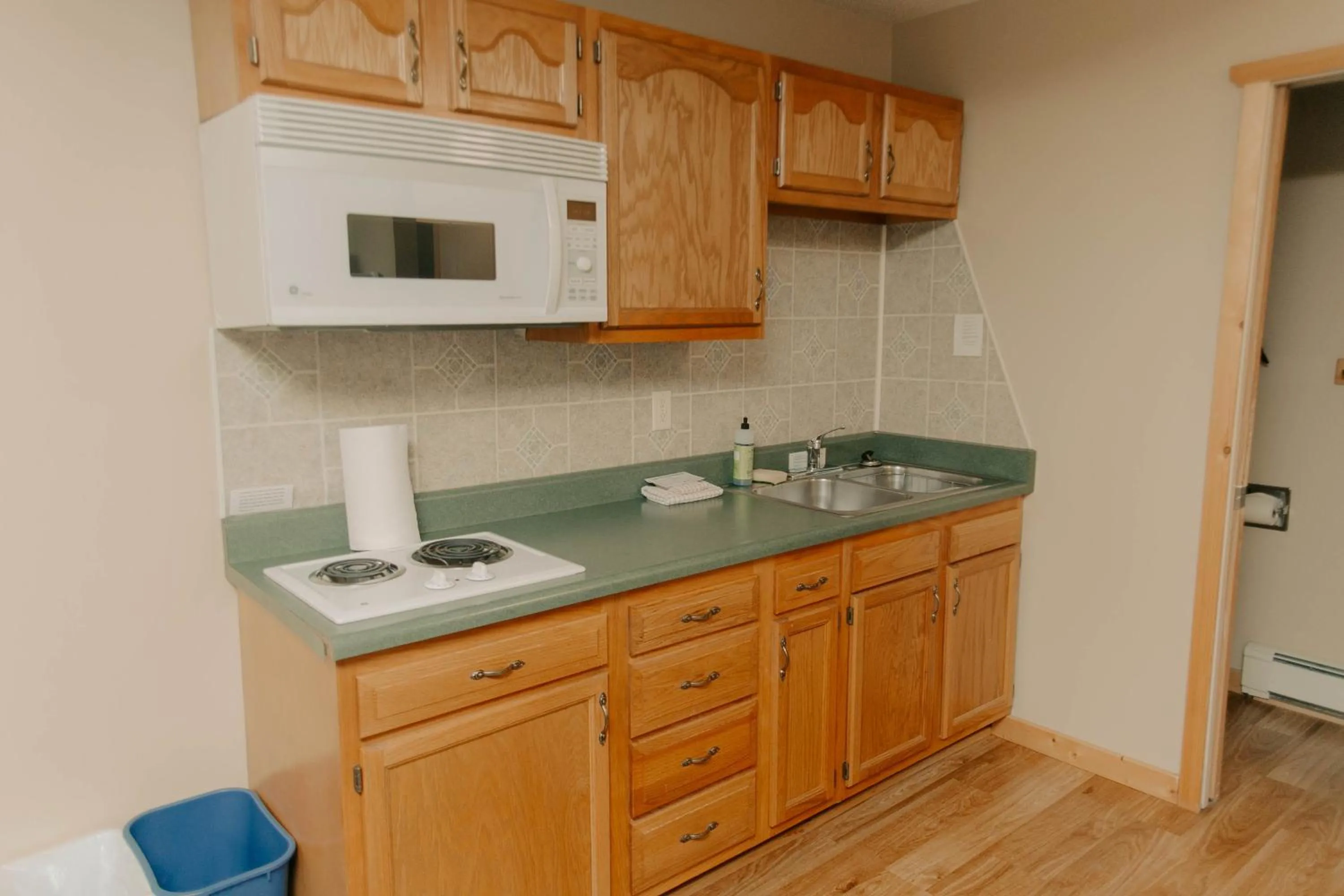 Kitchen or kitchenette in Adventure Inn