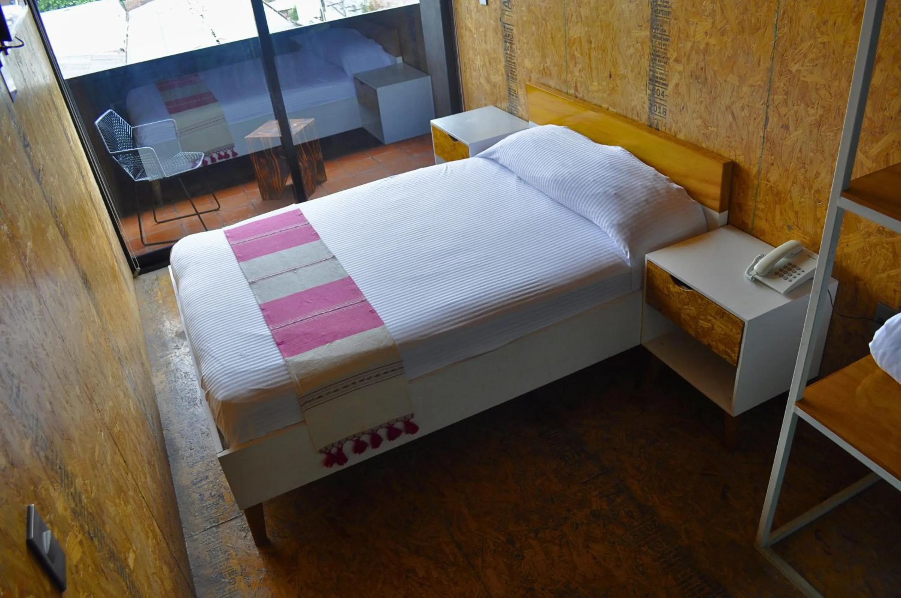 Bed in Hotel Momotus Tuxtla