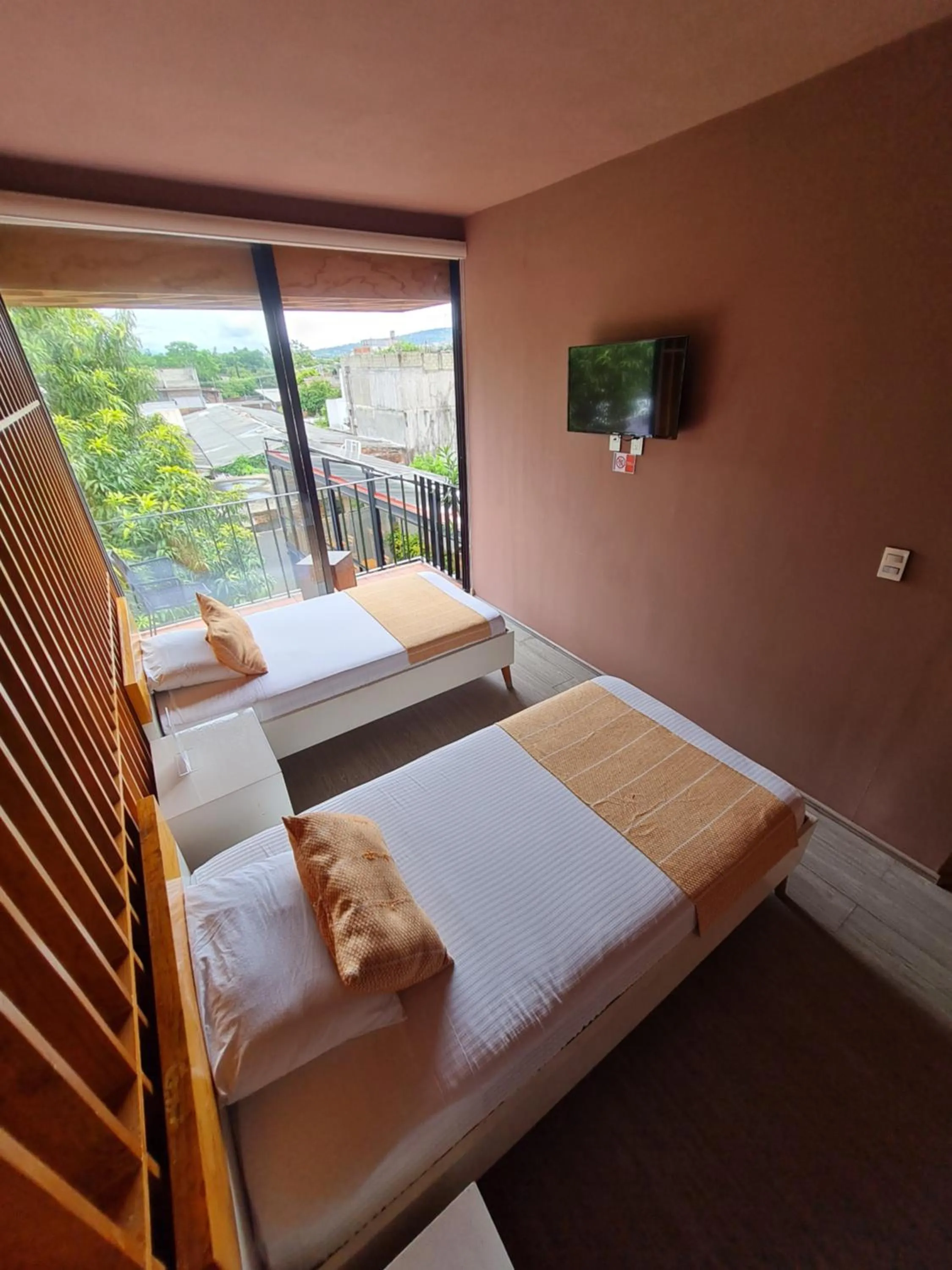 Bed in Hotel Momotus Tuxtla