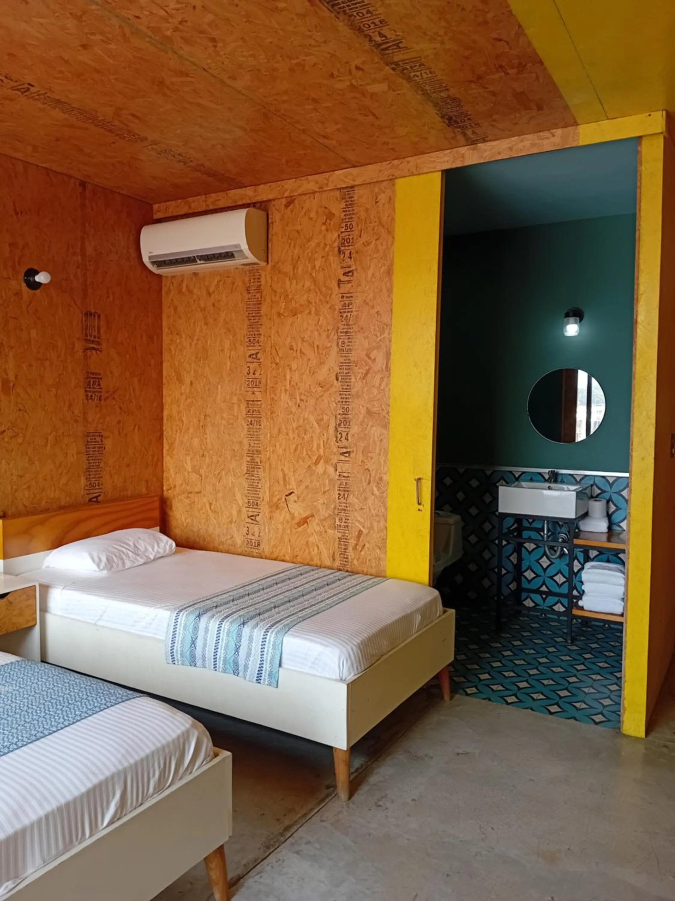 Bed in Hotel Momotus Tuxtla