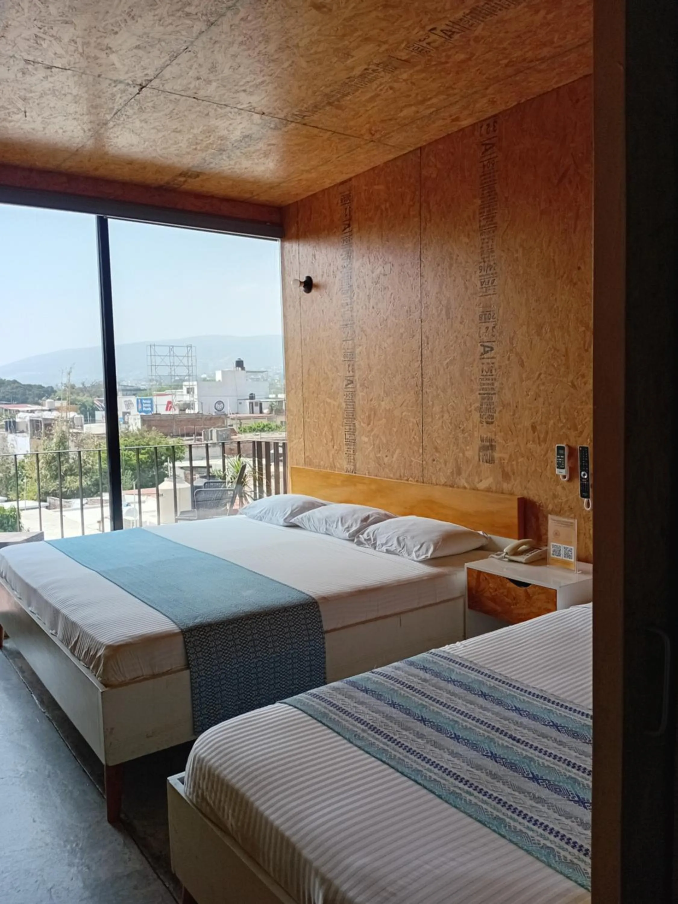 View (from property/room), Bed in Hotel Momotus Tuxtla