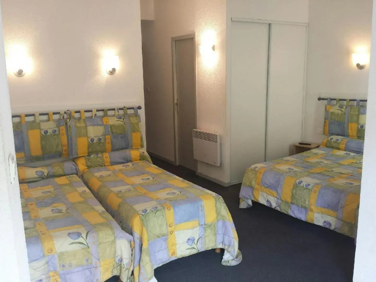 Quadruple Room in Hôtel Esplanade Eden Quadruple Room in Hôtel Esplanade Eden