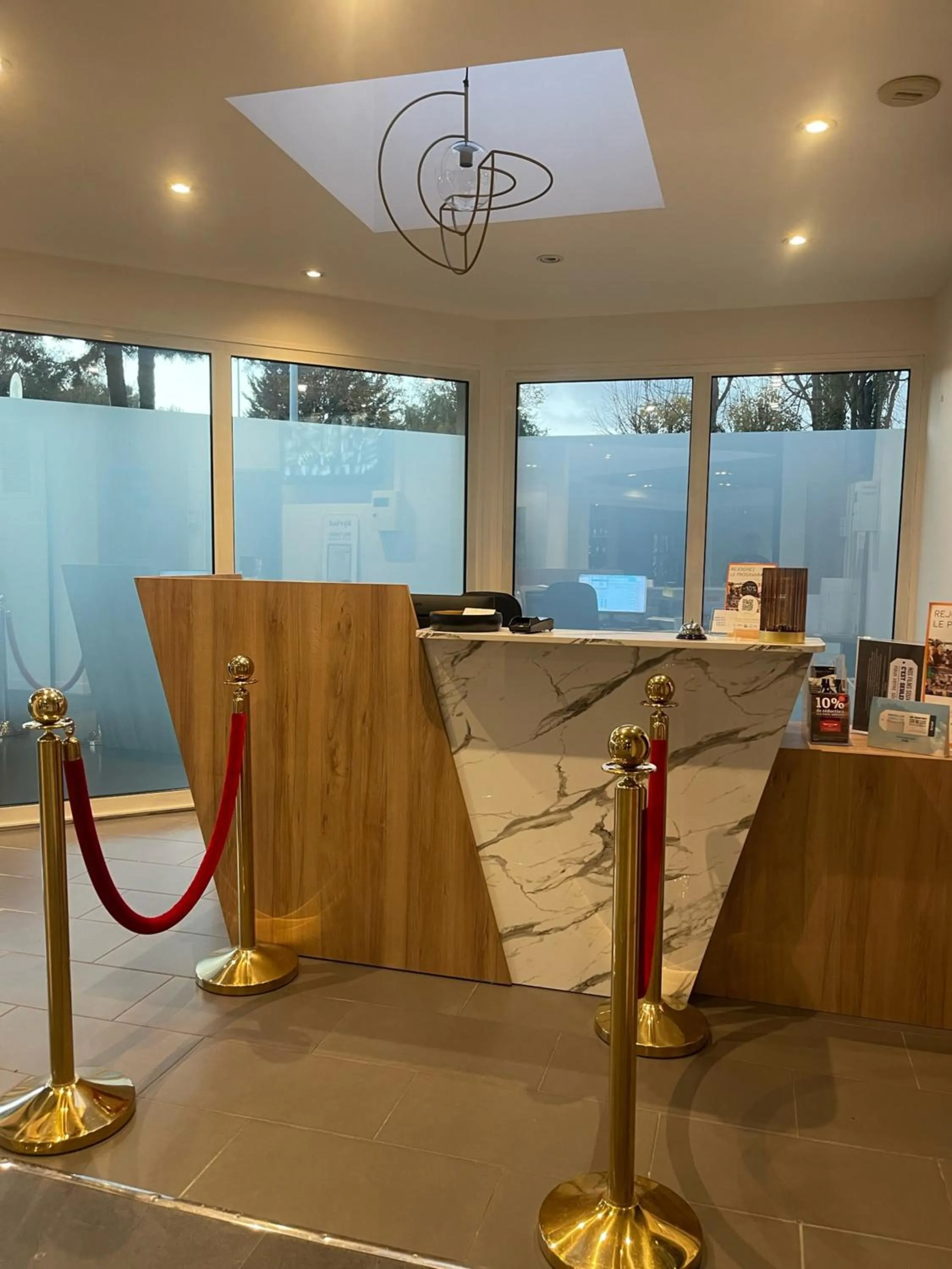 Lobby or reception in Kyriad Saint Fargeau Ponthierry - Apollonia