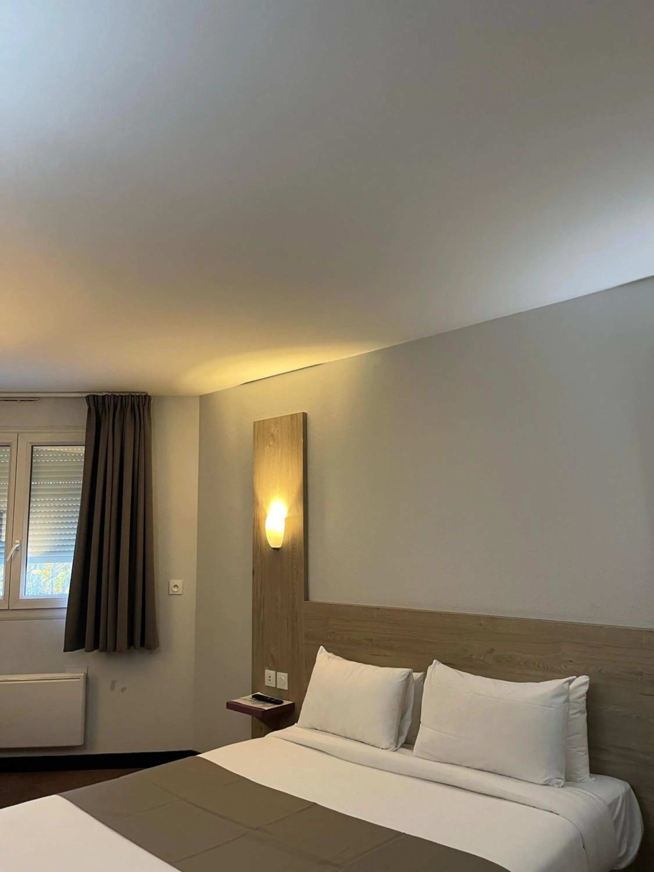 Bed in Kyriad Saint Fargeau Ponthierry - Apollonia