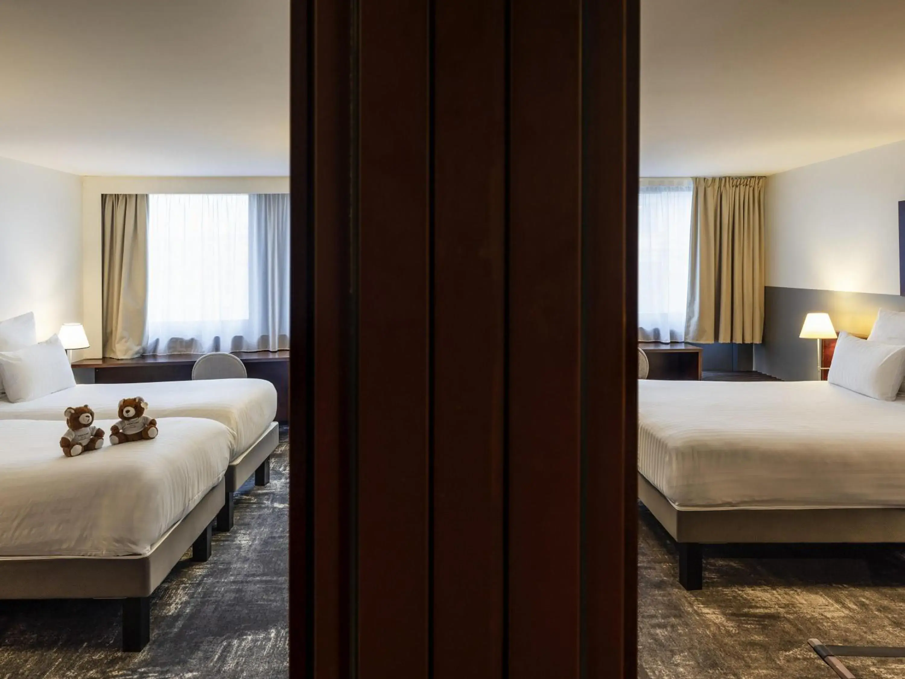 Family Room with One Double Bed and Two Single Beds in Mercure Paris Gare Montparnasse TGV Family Room with One Double Bed and Two Single Beds in Mercure Paris Gare Montparnasse TGV