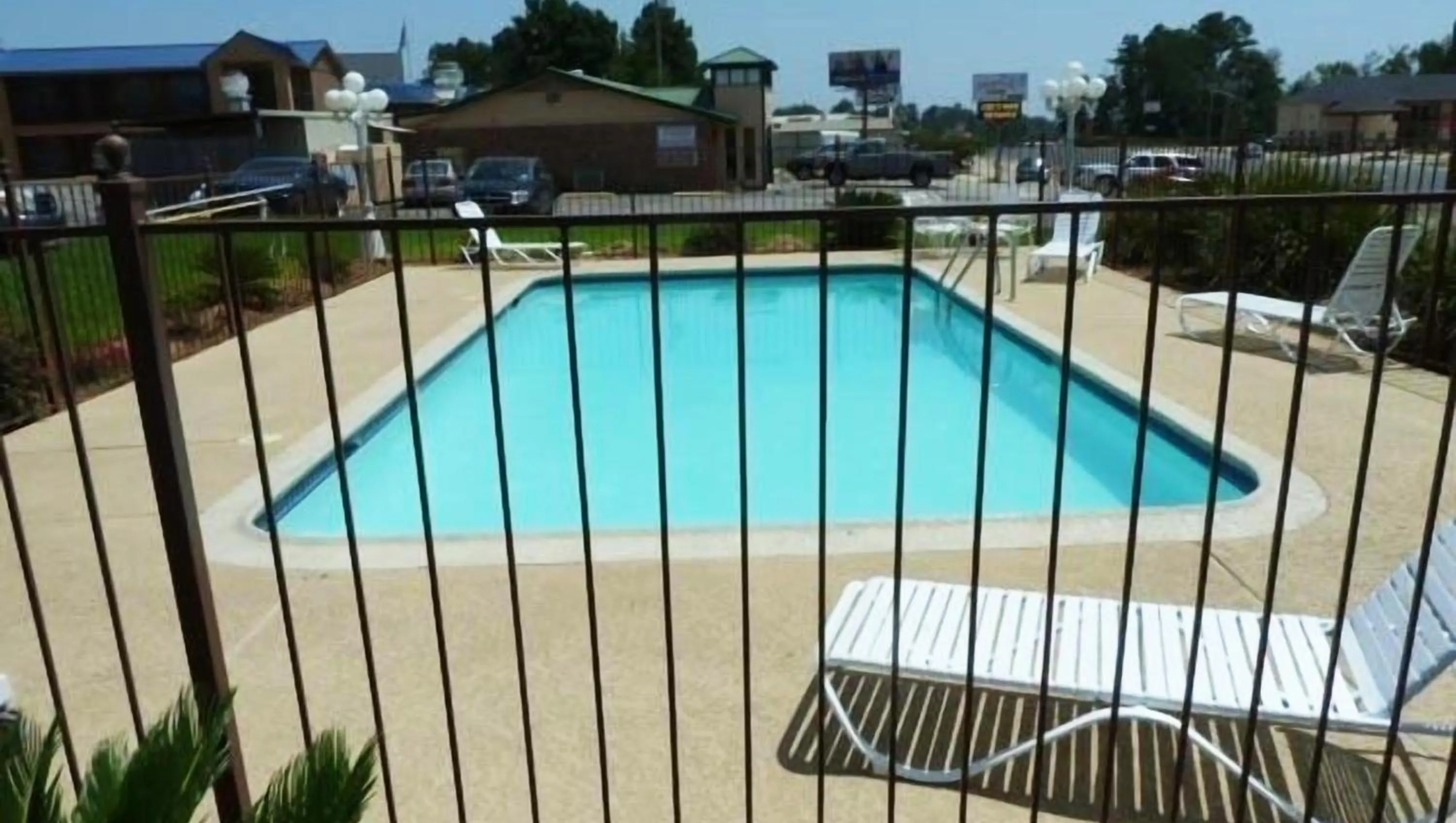 Swimming pool in Xecutive Inn and Suites
