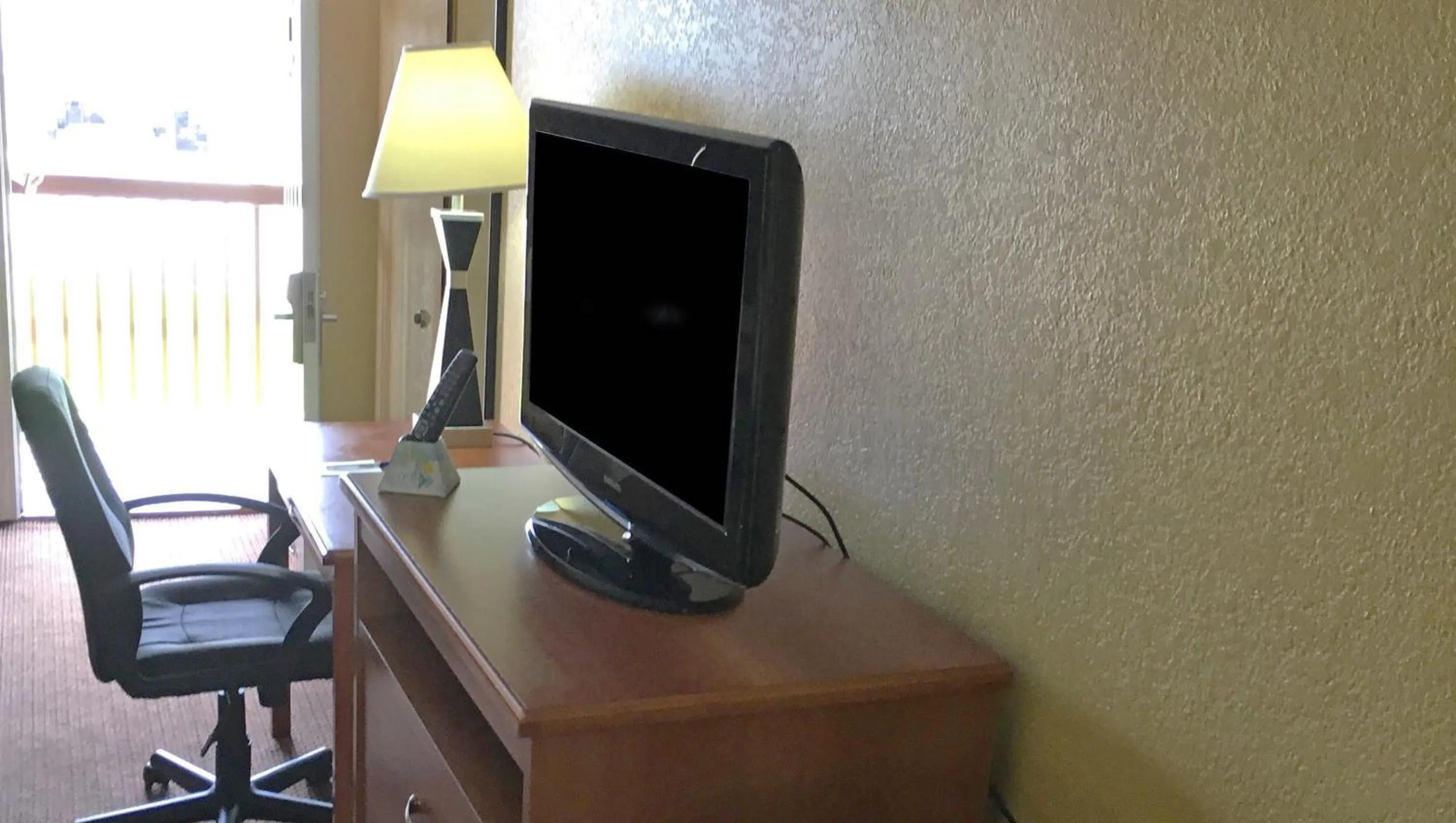 TV and multimedia in Xecutive Inn and Suites