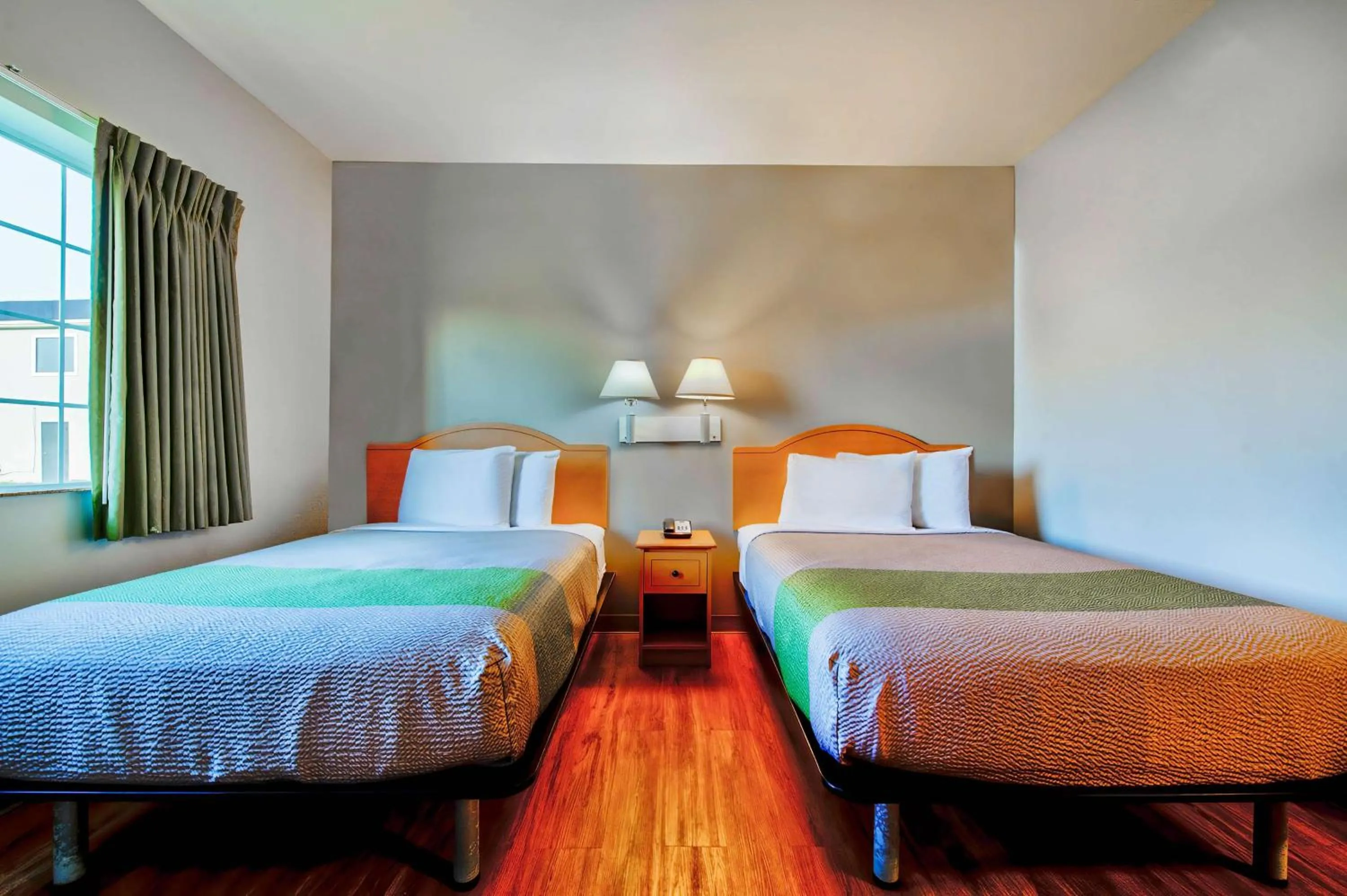 Bedroom in Studio 6-Sulphur, LA