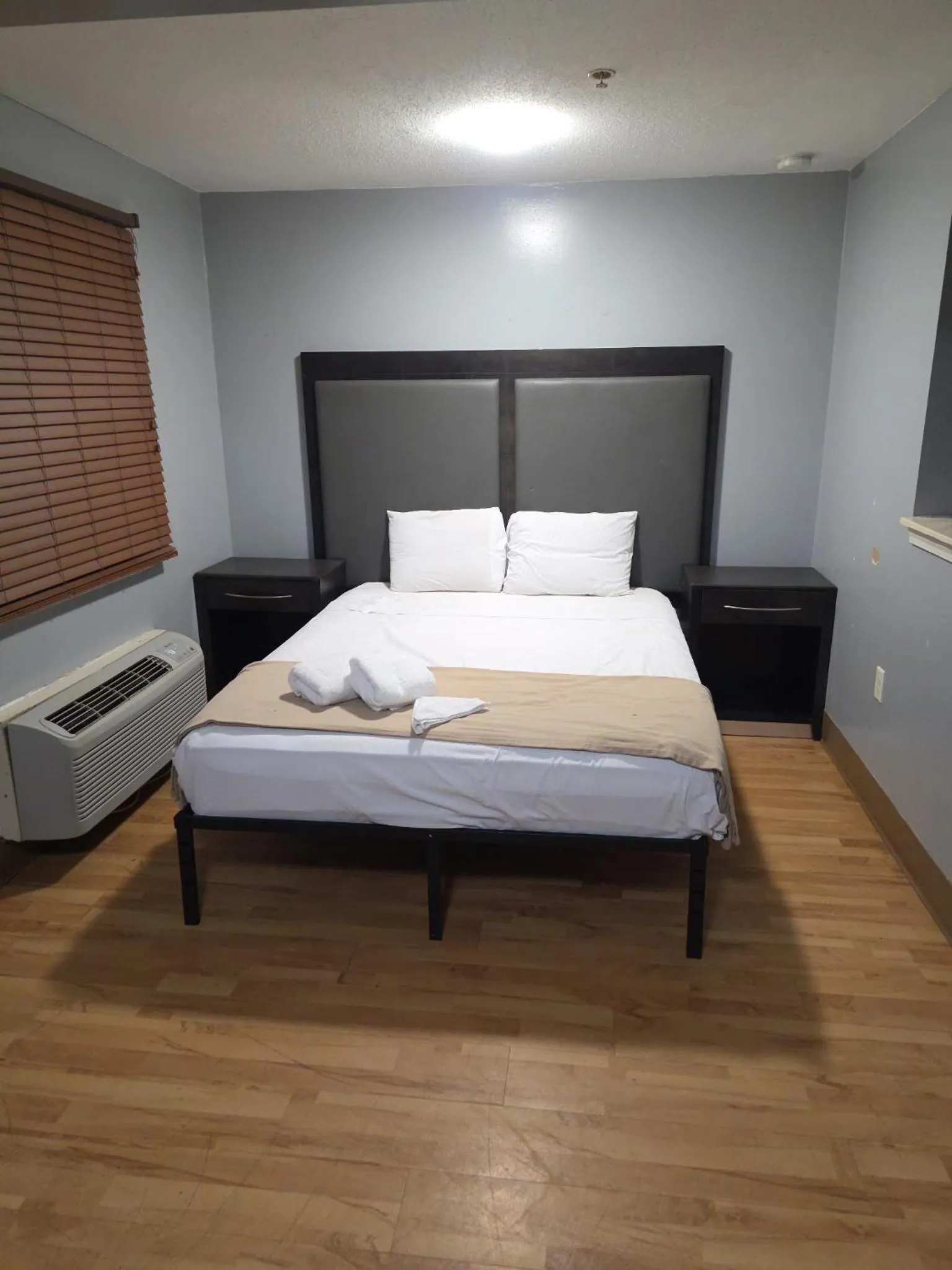Bed in Welcome Suites Hazelwood Extended Stay Hotel