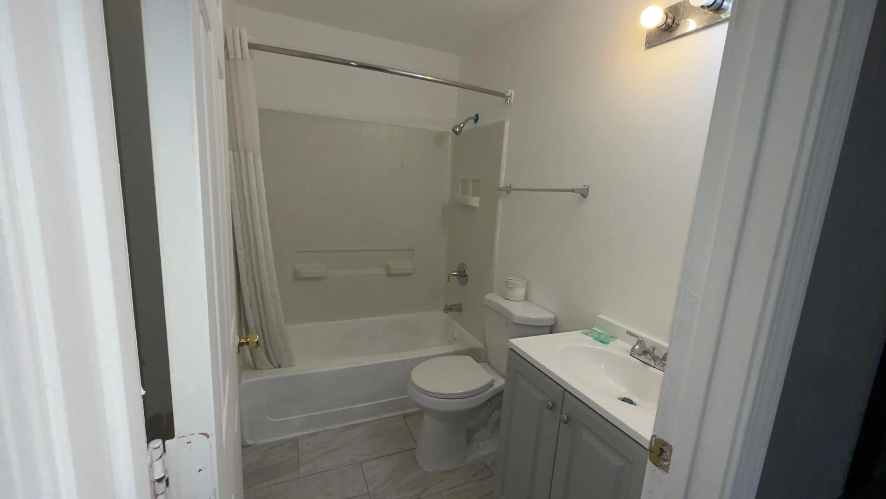 Toilet in Welcome Suites Hazelwood Extended Stay Hotel
