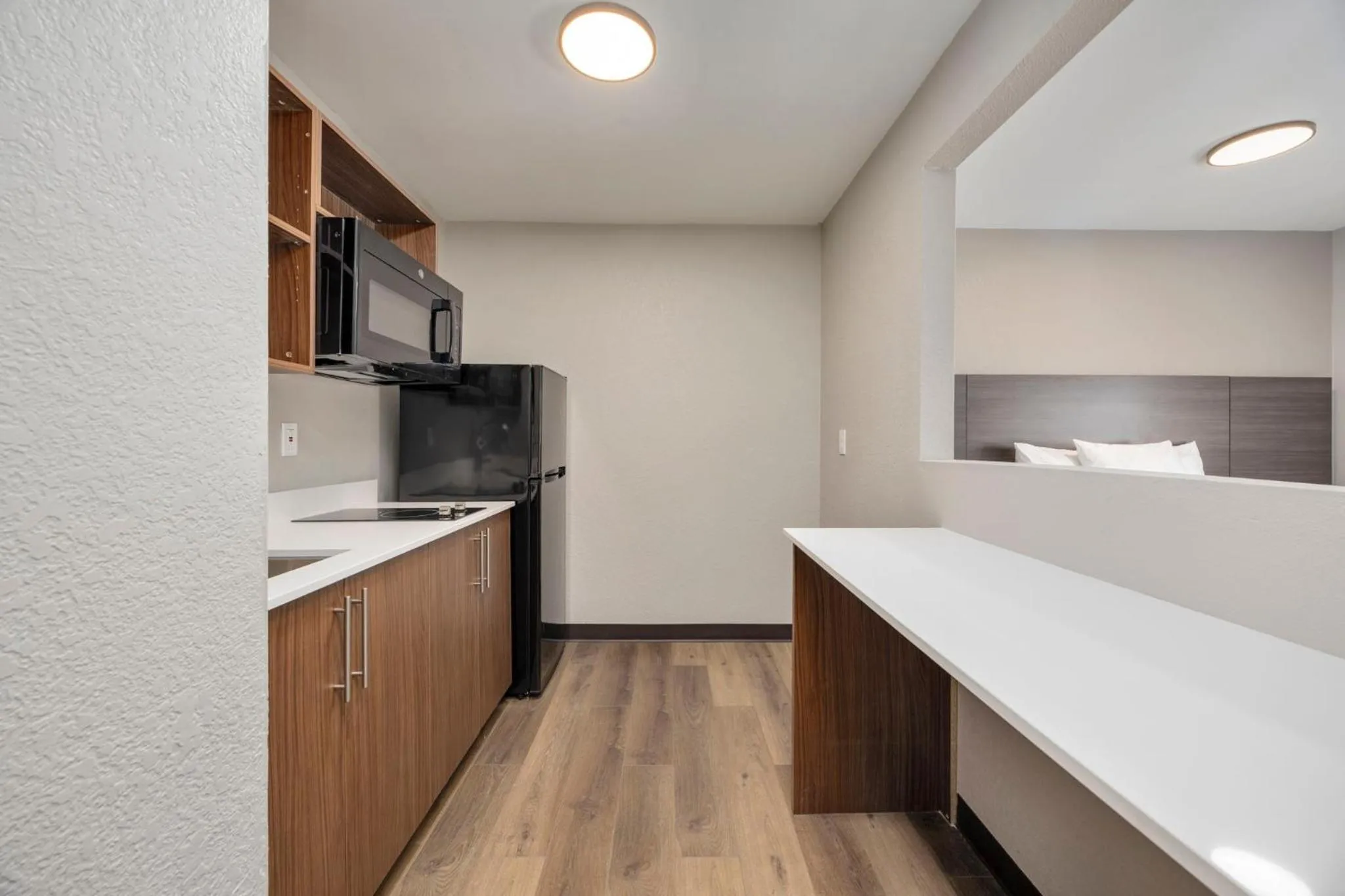 Kitchen or kitchenette in HomeStay Suites