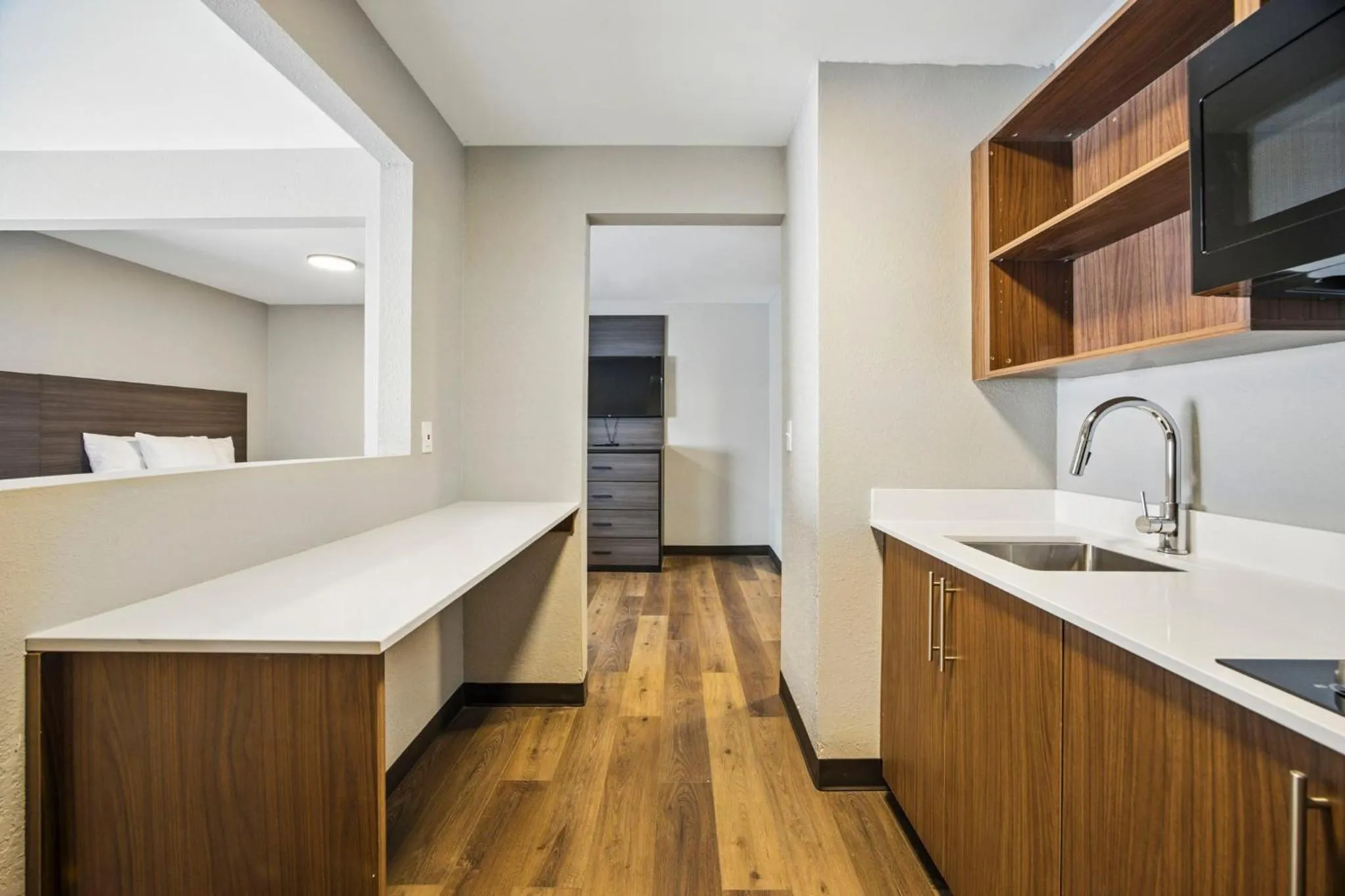 Kitchen or kitchenette in HomeStay Suites