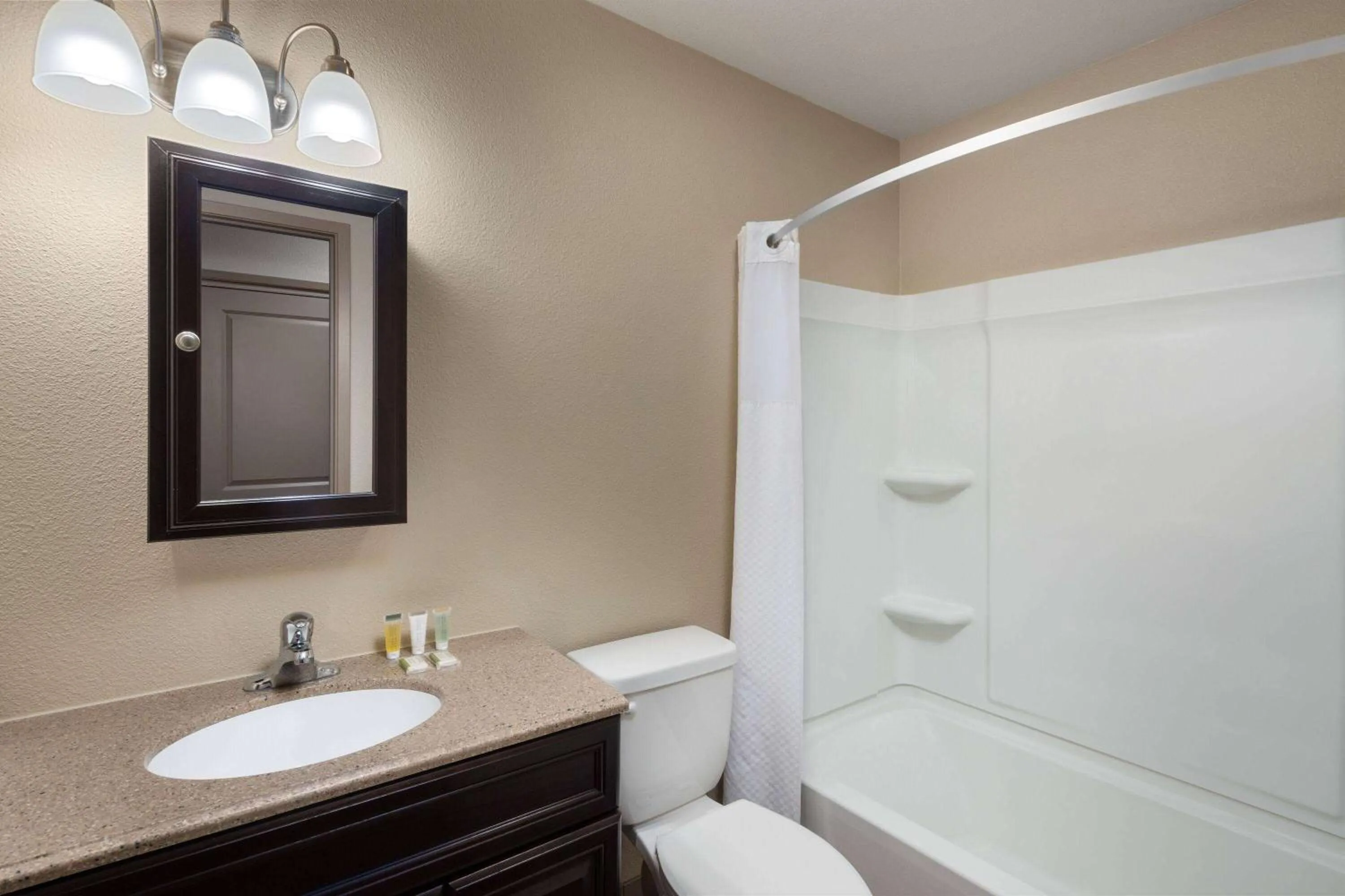 Bathroom in Super 8 by Wyndham Fallon