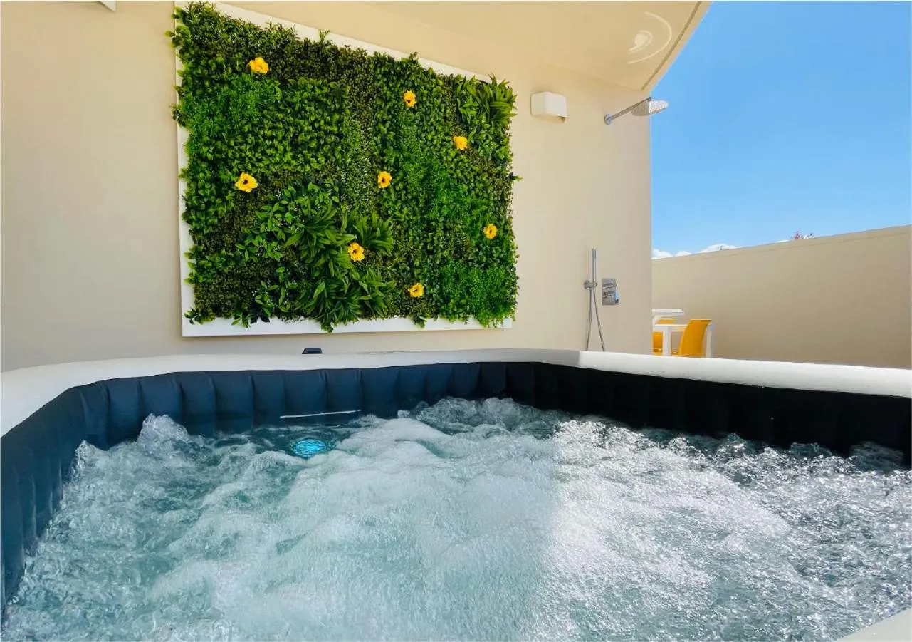 Hot Tub in La Collina di Montegrappa - Suites with Heated Private Pool - Suites with Shared Pool