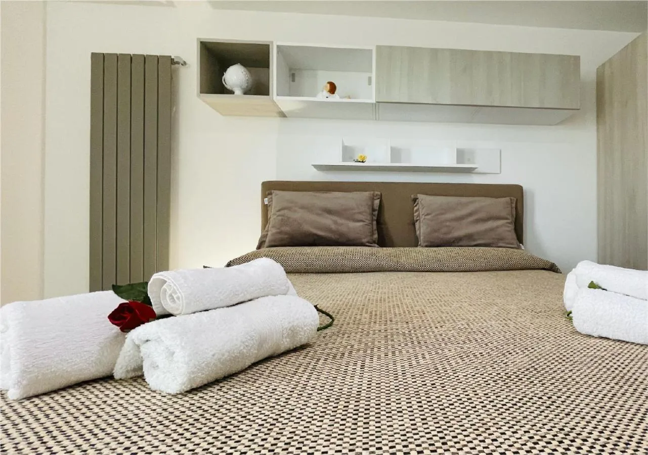 Bed in La Collina di Montegrappa - Suites with Heated Private Pool - Suites with Shared Pool